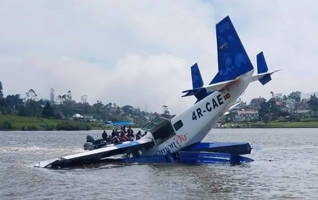 Nuwara Eliya, Sri Lanka: A Cinnamon Air seaplane carrying only its two crew members was involved in an incident while attempting to land at Gregory Lake in Nuwara Eliya on Wednesday afternoon. Both pilots survived the accident with no fatalities reported, officials and the operator confirmed. The Cessna 208 Caravan Amphibian aircraft, registered 4R-CAE, was approaching Gregory Lake at about 12:30 p.m. local time when it encountered difficulties during its final landing phase. The aircraft subsequently struck the water surface and came to rest in the lake. Local authorities, including police and the Sri Lanka Navy, responded immediately and coordinated with civilian boat operators on the lake to extract the two pilots from the submerged aircraft. Both were transported to the Nuwara Eliya District General Hospital for medical evaluation. Initial reports indicate that the injuries sustained were non-critical. Police spokespersons attributed the challenging conditions at the time of landing to strong winds, which may have contributed to the seaplane’s unstable descent and rough contact with the lake surface. Saffron Aviation (Pvt) Ltd, the parent company of Cinnamon Air, released a statement confirming that no passengers were on board and all crew members were safe. The company emphasised that safety remains its highest priority, adding that it is cooperating fully with aviation authorities and has initiated an internal review of the incident. The Civil Aviation Authority of Sri Lanka (CAASL) confirmed the incident in a formal statement, noting that a team of inspectors was immediately dispatched to Gregory Lake to begin a formal investigation. CAASL said that no third-party injuries were reported and that operations at the site were being assessed. CAASL Director General Captain Daminda Rambukwella highlighted the priority placed on aviation safety and said investigators will examine “all factors including weather conditions and aircraft operation” as part of the ongoing inquiry. Cinnamon Air has operated seaplane and domestic commuter flights in Sri Lanka since 2013, serving scenic destinations and connecting remote areas. The airline’s fleet includes amphibian-equipped aircraft specifically configured for water landings. According to company and aviation registry data, the affected Cessna 208 Caravan has been part of Cinnamon Air’s operations for several years. Gregory Lake has been a regular stop for seaplane operations, particularly for domestic tourism, offering aerial access to Nuwara Eliya’s highland region.