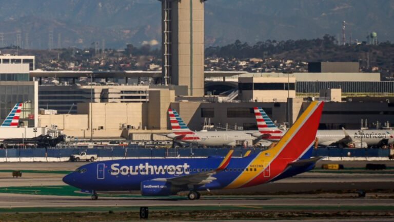 Washington, United States: The U.S. Department of Transportation (DOT) is rolling back aggressive enforcement of consumer-protection penalties against airlines, offering a reprieve on steep fines and signaling a broader shift in regulatory philosophy under the Biden and Trump administrations. In a regulatory notice and enforcement restructuring published Tuesday, the department outlined changes that will reduce its reliance on large civil penalties and focus instead on compliance cooperation and operational improvements by carriers. The moves effectively soften the industry’s exposure to historically high fines tied to consumer protection violations. A notable early example of the new approach is the waiver of a remaining $11 million civil penalty owed by Southwest Airlines for its handling of an operational meltdown during the December 2022 holiday travel period. The airline had been ordered to pay the amount by Jan. 31, 2026, as part of a broader $140 million settlement related to violations of U.S. consumer-protection rules following widespread cancellations and delays that stranded millions of travelers. DOT officials said the waiver reflects substantial investments Southwest has made in improving its network operations, scheduling systems and overall reliability since the incident. By crediting more than $112 million in operational upgrades and performance enhancements, the agency concluded that incentivizing proactive service improvements would deliver greater benefits to air travelers than imposing the final cash penalty. “The Department believes this approach is in the public interest as it incentivizes airlines to invest in improving their operations and resiliency, which benefits consumers directly,” according to the order. The change comes at a time when DOT leadership is revising enforcement procedures for the Office of Aviation Consumer Protection (OACP), the unit responsible for investigating and penalizing airlines for consumer-rights violations. Under the updated framework published in the Federal Register, the office will emphasize compliance assistance, warning letters and negotiated settlements rather than immediate financial penalties where appropriate. The regulatory filing states that enforcement actions will be grounded in clear statutory authority, with monetary penalties applied only where the law explicitly grants that authority. The department said the modifications aim to help airlines meet their obligations while creating a culture of compliance, rather than relying solely on punitive measures. Industry analysts said the shift reflects a broader deregulatory agenda that has emerged as the current administration reconsiders several consumer protection initiatives advanced over the past several years. During the Biden administration, DOT had significantly expanded passenger rights, including rules requiring automatic refunds for cancelled or significantly changed flights and stronger disclosure of airline fees. The proposed approach also aligns with a recent move to withdraw a Biden-era regulation that would have mandated cash compensation to passengers for delays and cancellations, and to scale back requirements for amenities such as meals and hotel accommodations when flights are disrupted.