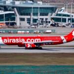 AirAsia X Flight Makes Emergency Landing In Brisbane Following Cabin Pressure Alert SEO DES: AirAsia X Flight carrying 142 passengers and 11 crew diverted to Brisbane after the crew observed a pressurisation warning and acted as a precaution SOCIAL: AirAsia X Flight D7‑221 from Sydney to Kuala Lumpur made a precautionary emergency landing in Brisbane late Sunday after the crew observed a cabin pressure warning. The Airbus A330‑300, carrying 142 passengers and 11 crew, descended from 34,000 ft and landed safely without injuries. Passengers were accommodated while the aircraft underwent engineering checks before continuing to Kuala Lumpur. The captain diverted as a precaution despite systems remaining within safe limits. Flight tracking data shows the aircraft broadcast an emergency squawk “7700” and made a sharp turn toward Brisbane. Airline officials confirmed the decision prioritized passenger and crew safety and followed standard aviation protocols. Image: byeangel (Flickr) Video: Air Asia Brisbane, Australia: An AirAsia X long‑haul international flight travelling from Sydney to Kuala Lumpur was forced to divert to Brisbane Airport late on Sunday night after the flight crew reported a cabin pressure anomaly. AirAsia X Flight D7‑221 departed Sydney Kingsford Smith Airport (SYD) at approximately 10:08 pm AEDT bound for Kuala Lumpur International Airport (KUL). The Airbus A330‑300, registered 9M‑XBG, was cruising at about 34,000 feet when the crew initiated a precautionary emergency descent and diversion to Brisbane, roughly two hours into the scheduled eight‑hour journey. Flight tracking data confirms the aircraft broadcast an international “7700” emergency squawk the code pilots use to signal a general emergency and made a sharp turn back toward Queensland before descending to a lower cruise level. According to AirAsia X, the crew observed an alert related to cabin pressure. While onboard systems indicated that pressurisation remained within safe limits, the captain elected to divert to the nearest major airport as a precautionary measure, in accordance with established safety protocols. An airline spokesperson said the decision reflected a conservative approach to an unexpected technical alert and that the safety of passengers and crew remained the airline’s highest priority. The aircraft landed safely in Brisbane shortly before midnight on Sunday without injury to passengers or crew reported. Aviation sources noted the controlled descent from cruising altitude to approximately 10,000 feet prior to touchdown. There were 142 passengers and 11 crew members on board. Following the unscheduled stop, AirAsia X arranged hotel accommodation and food provisions for affected travellers while the aircraft underwent further technical assessment. AirAsia X confirmed the aircraft remained on the ground in Brisbane while undergoing detailed engineering checks to identify the cause of the pressurisation alert before continuing to Kuala Lumpur.