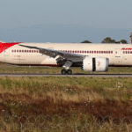 London, United Kingdom: The UK Civil Aviation Authority (CAA) has formally asked Air India to provide a detailed explanation of an incident involving a Boeing 787-8 Dreamliner that departed London Heathrow Airport on February 1 despite a reported anomaly with a critical aircraft system. The regulator has warned the airline that failure to respond fully within one week could trigger regulatory action affecting its Dreamliner operations. Air India flight AI132, operating a Boeing 787-8 Dreamliner registered VT-ANX, departed Heathrow for Bengaluru after pilots noted irregular behaviour with a fuel control switch, a vital cockpit control that regulates fuel flow to the engines. During engine start, one of the two fuel control switches did not remain positively latched in the “RUN” position on the first two attempts before stabilising on the third. The flight continued without in-air issues and landed in Bengaluru. Upon arrival, the crew filed a defect report citing the anomaly, and the aircraft was grounded for inspection on February 2. The UK Civil Aviation Authority has taken the step of demanding a formal response from Air India, including: A comprehensive account of pre-flight maintenance actions taken before departure, A root-cause analysis of the fuel control switch event, A preventive action plan to reduce the risk of recurrence across Air India’s Dreamliner fleet, which comprises 33 aircraft. In official correspondence, the CAA emphasised that regulators routinely seek detailed explanations following incidents affecting safety-critical components, particularly when an aircraft departs with a potential defect. Air India said it conducted precautionary re-inspections of fuel control switches across its Boeing 787 fleet after the incident and reported no issues found during these checks. The airline acknowledged the Directorate General of Civil Aviation (DGCA) oversight and said it will comply with the regulator’s guidance to circulate Boeing’s recommended operating procedures for the switches to all flight crews. India’s DGCA also issued a clarification, stating that post-flight inspections determined the fuel switches were serviceable and functioning normally. According to the regulator, the switch may move if light pressure is applied in an incorrect direction, but its design does not indicate a defect when used according to approved procedures. The DGCA advised Air India to reinforce correct switch handling among pilots. Fuel control switches are crucial for aircraft safety. They allow pilots to start and shut down engines and are designed with locking mechanisms to prevent unintended movement. This category of component has been under heightened scrutiny following the June 2025 crash of an Air India Boeing 787-8 in Ahmedabad, where preliminary investigation reports indicated fuel control switches played a role in dual-engine power loss shortly after takeoff. That accident, which resulted in significant loss of life, triggered industry-wide inspections and close regulatory observation of Boeing 787 systems. Though the final accident report remains pending, aviation authorities worldwide have been monitoring similar technical aspects, including fuel system controls, in current operations. Air India faces a deadline to submit its response to the UK CAA within one week of the February 4 notice. The airline has stressed safety as its utmost priority and reiterated cooperation with international regulators and Boeing in evaluating the matter.
