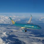 Vietnam Airlines Signs US$8.1B Deal For 50 Boeing 737-8 Jets To Support Fleet Growth SEO DES: Vietnam Airlines plans to expand its fleet to about 151 aircraft by 2030, with Boeing 737-8 deliveries scheduled between 2030 and 2032 to support growth SOCIAL: Vietnam Airlines has signed a deal to purchase 50 Boeing 737-8 aircraft in an agreement valued at up to US$8.1 billion, signed in Washington, D.C., during General Secretary Tô Lâm’s official visit to the United States. Deliveries are scheduled between 2030 and 2032, supporting the airline’s fleet expansion to around 151 aircraft by 2030 and strengthening its domestic and regional network. Chairman Đặng Ngọc Hòa said the investment advances fleet modernization and operational efficiency. Boeing Commercial Airplanes CEO Stephanie Pope said the 737-8 will complement Vietnam Airlines’ existing 787 fleet to enhance regional connectivity. The order forms part of broader aerospace agreements signed by Vietnamese carriers in Washington, including commitments by Sun PhuQuoc Airways and Vietjet Air. Washington, United States: Vietnam Airlines, the national flag carrier of Vietnam, has formally agreed to purchase 50 Boeing 737-8 narrow-body aircraft in a major fleet modernization move valued at up to US $8.1 billion based on 2025 list pricing. The contract was signed on Thursday in Washington, D.C., during the official visit of General Secretary Tô Lâm to the United States. The deal, witnessed by senior Vietnamese and U.S. officials, marks Vietnam Airlines’ first direct narrowbody acquisition from Boeing and represents a cornerstone of its long-term strategy to expand domestic and regional operations amid rising air travel demand. Vietnam Airlines plans to take delivery of the Boeing 737-8 jets between 2030 and 2032. With this expansion, the carrier projects its total fleet will grow to approximately 151 aircraft by 2030, strengthening its ability to serve high-traffic domestic and short-haul international routes. The airline’s Chairman of the Board of Directors, Đặng Ngọc Hòa, said the investment underscores a “comprehensive and forward-looking” approach to fleet modernization, financial resilience, and human resource development. He emphasized that the new aircraft will enhance “operational performance and service standards” while deepening the airline’s long-standing partnership with Boeing. The Boeing 737-8 is Boeing’s most versatile narrow-body jet, featuring advanced aerodynamics, CFM International LEAP-1B engines and next-generation winglets that deliver about 20 % better fuel efficiency and lower emissions than older aircraft models. Each jet can accommodate up to 200 passengers with a range of up to 6,570 km (approximately 3,550 nautical miles), making it suitable for VN’s dense short- and medium-haul market segments. Boeing Commercial Airplanes President and CEO Stephanie Pope said the 737-8 will support Vietnam Airlines as it aligns the 737 MAX family with its existing Boeing 787 Dreamliner fleet to enhance connectivity across Asia. Vietnam’s aviation market continues to expand rapidly, driven by robust economic growth and increasing mobility across Southeast Asia. Vietnam Airlines aims to maintain double-digit annual growth in key performance indicators, including passenger and cargo traffic, over the next five years. Industry analysts note that the addition of the 737-8 will diversify Vietnam Airlines’ fleet, which currently consists primarily of Airbus A320 family aircraft in the narrowbody segment and Boeing 787 Dreamliners on long-haul services. The Boeing order is part of a flurry of aerospace contracts signed by Vietnamese carriers in Washington this week. In related deals, Sun PhuQuoc Airways committed to purchasing 40 Boeing 787-9 Dreamliners in a US$22.5 billion agreement, and Vietjet Air finalised financing for six Boeing 737-8 aircraft. Vietnam Airlines is also in negotiations with Boeing for an additional 30 wide-body jets worth up to US$12 billion, aimed at bolstering its long-haul international network.