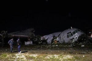 15 Killed In Bolivian Air Force C-130 Crash Near El Alto Airport, At Least 30 Injured SEO DES: The aircraft carrying newly printed banknotes skidded off the runway and struck multiple vehicles on Costanera Avenue, a busy urban road SOCIAL: A Bolivian Air Force Hercules C‑130 cargo plane crashed near El Alto International Airport on February 27, 2026, killing 15 people and injuring at least 30 others. The aircraft, carrying newly printed banknotes for the central bank, skidded off the runway and struck multiple vehicles on Costanera Avenue, a busy urban road, causing widespread chaos. Emergency responders recovered victims, treated the injured, and secured the scene, while police dispersed crowds attempting to collect scattered cash. The crash caused significant damage to dozens of vehicles, and flight operations at the airport were temporarily suspended. Investigators are examining weather, technical issues, and pilot factors as potential causes. El Alto’s high altitude added operational challenges for the aircraft. Authorities continue search and recovery operations, with further updates expected from the Bolivian Ministry of Defence. El Alto, Bolivia: A Bolivian Air Force Hercules C‑130 cargo aircraft crashed onto a crowded roadway near El Alto International Airport on Friday evening, February 27, 2026, killing at least 15 people and injuring at least 30 more, authorities said. The aircraft, carrying newly printed banknotes for Bolivia’s central bank, veered off the runway and struck multiple vehicles on a busy urban avenue, triggering a chaotic emergency response. The military transport aircraft, operated by the Bolivian Air Force, departed from Santa Cruz and was approaching El Alto, a high‑altitude city adjacent to the administrative capital, La Paz, when it skidded off the runway at El Alto International Airport. The Hercules C‑130 then slid onto Costanera Avenue, a principal thoroughfare often filled with traffic. Local officials confirmed it overran the runway and entered a busy road, impacting dozens of vehicles. Fire Chief Pavel Tovar told reporters that at least 15 people have died in the crash. Officials have not fully clarified whether the fatalities include crew members aboard the aircraft, people in struck vehicles, or both. Rescue teams recovered bodies from the crash scene, including the roadway where mangled debris and aircraft wreckage lay scattered. At least 30 people were injured, with several reported in serious condition at nearby hospitals. Emergency services, including firefighters and medical teams, worked into the night to transport the wounded and control the scene. The cargo plane was confirmed to be transporting newly printed Bolivian banknotes, reportedly bound for circulation in other parts of the country. Upon impact, a large amount of currency spilled onto the roadway. Videos shared on social media showed crowds of people gathering near the wreckage, with some picking up scattered bills. Local police deployed water hoses and tear gas to disperse bystanders and secure the area, complicating rescue efforts. Bolivia’s central bank said the notes were not yet legal tender at the time of the crash, as they had not been issued into circulation. Local media footage and official statements from the national fire department showed dozens of vehicles damaged or destroyed by the aircraft’s uncontrolled exit from the runway. Cars, trucks, and minibuses along Costanera Avenue bore the brunt of the impact. El Alto International Airport temporarily suspended flight operations in the aftermath to facilitate emergency work and investigations. Boliviana de Aviación, Bolivia’s national airline, confirmed the crashed aircraft was not part of its commercial fleet. Official investigators have launched a probe to determine the precise cause of the accident. Although weather conditions including reports of poor visibility and possible hail were present at the time, authorities have not yet confirmed whether weather, technical failure, pilot error, or a combination of factors contributed to the crash. El Alto’s high altitude roughly 4,000 m (about 13,000 ft) above sea level also presents operational challenges for aircraft, where thinner air affects engine performance and braking efficiency. Search and rescue efforts, forensic recovery of remains, and broader investigations are ongoing. The Bolivian Ministry of Defence and national aviation authorities are expected to provide further updates.