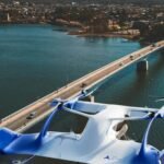 The ePlane Company Partners With NVIDIA To Build India’s 1st Electric Air Taxi Twin SEO DES: The initiative enables virtual testing of aerodynamics sensors & flight scenarios, cutting risk & time while NVIDIA’s IGX boosts situational awareness SOCIAL: Chennai-based The ePlane Company has partnered with NVIDIA to develop a high-fidelity digital twin of its e200x electric air taxi using NVIDIA Omniverse simulation technology. Announced on 19 February 2026, the initiative enables advanced virtual testing of aerodynamics, sensors and flight scenarios, reducing real-world risk and development time. The company will also integrate NVIDIA’s IGX platform for onboard computing and sensor fusion to enhance autonomy and situational awareness. The digital twin will support predictive maintenance and certification efforts, marking a significant step for India’s Urban Air Mobility sector, though regulatory and computational challenges remain. Chennai, India: The ePlane Company, a deep-tech aerospace startup incubated at the Indian Institute of Technology (IIT) Chennai, has announced a significant milestone in the development of its e200x electric air taxi: the creation of a high-fir-delity digital twin model built with technology from NVIDIA. The announcement was made on 19 February 2026 in an official statement published by the company. The digital twin, constructed using NVIDIA’s Omniverse simulation libraries, is a virtual representation of the ePlane eVTOL (electric Vertical Take-Off and Landing) aircraft designed to replicate complex aerodynamic behaviours, sensor inputs and flight scenarios with high precision. Engineers can now simulate interactions that would be expensive, risky or time-consuming to test physically, such as extreme weather conditions and emergency manoeuvres. To power onboard computing and real-time decision-making, The ePlane Company will deploy NVIDIA’s IGX platform, aimed at integrating multiple sensors like cameras and radar with advanced data-fusion and visualisation capabilities. This system is expected to support autonomy algorithms and enhance situational awareness during flight operations. In a statement included in the press release, Prof. Satya Chakravarthy, Founder and Chief Technology Officer of The ePlane Company, said the collaboration “blurs the line between the digital and the physical” and allows the company to validate its flight-operations systems extensively through simulation before real-world testing. The digital twin also functions as a predictive analytics engine, mirroring real-world aircraft behaviour to forecast maintenance requirements. This capability could reduce operational downtime and improve reliability as the e200x moves toward regulatory certification. The initiative marks a noteworthy advance for India’s growing Urban Air Mobility (UAM) sector, which has seen increasing investment and interest from both government and private players. The ePlane Company holds India’s first Design Organisation Approval (DOA) for a privately developed electric aircraft and operates a 60,000-square-foot manufacturing facility in Chennai. Despite the technological promise, regulatory frameworks for certifying eVTOL aircraft are still evolving in India and globally, which analysts identify as a key hurdle before large-scale deployment can begin. Moreover, building and validating high-accuracy digital twins requires significant computational resources, including high-performance GPUs and specialised engineering expertise. The ePlane e200x project essentializes the convergence of advanced simulation tools and next-generation aerospace design, reinforcing India’s ambitions in electric aviation and setting the stage for future developments in aerial mobility.