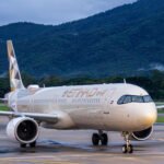 Abu Dhabi, United Arab Emirates: Etihad Airways delivered its strongest financial and operational performance in the airline’s history for the full year 2025, marking robust growth, network expansion and enhanced customer experience, the carrier announced on 24 February 2026. The Abu Dhabi-based flag carrier reported a profit after tax of AED 2.6 billion (US $698 million), a 47 % year-on-year increase compared with 2024. This marked the airline’s fourth consecutive year of profitability and reflected sustained demand across global markets. Etihad carried 22.4 million passengers in 2025, up 21 % year-on-year, supported by a 21 % increase in capacity and available seat kilometres (ASK) of 111.5 billion. Passenger load factor improved to 88.3 % (+2 percentage points), illustrating strong demand across its international network. Total revenue rose 21 % year-on-year to AED 30.7 billion (US $8.4 billion), driven by both passenger and cargo operations. Passenger revenue jumped 24 % to AED 25.8 billion (US $7.0 billion), while cargo revenue increased 8 % to AED 4.5 billion (US $1.2 billion), supported by higher capacity and cargo volumes that grew 9 % to more than 700,000 leg tonnes. Operating performance strengthened significantly. EBITDA climbed 37 % year-on-year to AED 6.3 billion (US $1.7 billion), resulting in a 20 % EBITDA margin (+2 percentage points). Etihad’s profit margin improved to 8.4 % (+1.5 percentage points), more than double the global airline industry average of 3.9 %, according to IATA estimates. Strong cash generation remained a hallmark of the year, with operating cash flow approaching AED 8.0 billion (more than US $2 billion). This enabled the airline to fully fund its capital expenditure requirements and reduce debt. Etihad expanded its operating fleet to 127 aircraft, the largest in its history, with 29 aircraft added during 2025. The enlarged fleet supported growth across Europe, Asia, Africa and North America. The airline’s network grew from 94 to 110 destinations, bolstering global connectivity and reinforcing Abu Dhabi’s positioning as a major aviation hub. Etihad’s growth helped drive tourism to Abu Dhabi. Point-to-point traffic rose by 900,000 passengers to 5.5 million compared with 2024, while the stopover visitor count more than doubled to 170,000. The airline accounted for approximately 50 % of total passenger growth across UAE carriers in 2025, highlighting its central role in the nation’s air travel sector. Etihad continued investing in customer experience with product upgrades across cabins, digital enhancements and expanded services. Overall net promoter scores improved year-on-year. The airline also received more than 25 international awards for customer experience, safety and operational performance. Throughout 2025, Etihad welcomed more than 3,200 new employees and promoted around 2,200 staff, including new cabin crew and pilots, further strengthening its operational capabilities. Antonoaldo Neves, Chief Executive Officer of Etihad Airways, said, “2025 has been a defining year for Etihad, delivering our strongest performance across every key metric and marking our fourth consecutive year of profitability. These results confirm that our strategy is working, growing sustainably, strengthening our financial position, and continuing to deliver a high-quality experience for our guests.” With a strengthened financial position, an expanded fleet and a broader global footprint, Etihad enters 2026 poised for continued growth, deeper market penetration and ongoing contribution to Abu Dhabi’s economic and tourism strategies.