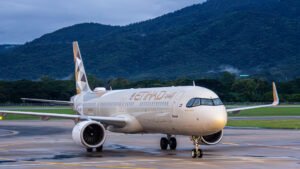 Abu Dhabi, United Arab Emirates: Etihad Airways delivered its strongest financial and operational performance in the airline’s history for the full year 2025, marking robust growth, network expansion and enhanced customer experience, the carrier announced on 24 February 2026. The Abu Dhabi-based flag carrier reported a profit after tax of AED 2.6 billion (US $698 million), a 47 % year-on-year increase compared with 2024. This marked the airline’s fourth consecutive year of profitability and reflected sustained demand across global markets. Etihad carried 22.4 million passengers in 2025, up 21 % year-on-year, supported by a 21 % increase in capacity and available seat kilometres (ASK) of 111.5 billion. Passenger load factor improved to 88.3 % (+2 percentage points), illustrating strong demand across its international network. Total revenue rose 21 % year-on-year to AED 30.7 billion (US $8.4 billion), driven by both passenger and cargo operations. Passenger revenue jumped 24 % to AED 25.8 billion (US $7.0 billion), while cargo revenue increased 8 % to AED 4.5 billion (US $1.2 billion), supported by higher capacity and cargo volumes that grew 9 % to more than 700,000 leg tonnes. Operating performance strengthened significantly. EBITDA climbed 37 % year-on-year to AED 6.3 billion (US $1.7 billion), resulting in a 20 % EBITDA margin (+2 percentage points). Etihad’s profit margin improved to 8.4 % (+1.5 percentage points), more than double the global airline industry average of 3.9 %, according to IATA estimates. Strong cash generation remained a hallmark of the year, with operating cash flow approaching AED 8.0 billion (more than US $2 billion). This enabled the airline to fully fund its capital expenditure requirements and reduce debt. Etihad expanded its operating fleet to 127 aircraft, the largest in its history, with 29 aircraft added during 2025. The enlarged fleet supported growth across Europe, Asia, Africa and North America. The airline’s network grew from 94 to 110 destinations, bolstering global connectivity and reinforcing Abu Dhabi’s positioning as a major aviation hub. Etihad’s growth helped drive tourism to Abu Dhabi. Point-to-point traffic rose by 900,000 passengers to 5.5 million compared with 2024, while the stopover visitor count more than doubled to 170,000. The airline accounted for approximately 50 % of total passenger growth across UAE carriers in 2025, highlighting its central role in the nation’s air travel sector. Etihad continued investing in customer experience with product upgrades across cabins, digital enhancements and expanded services. Overall net promoter scores improved year-on-year. The airline also received more than 25 international awards for customer experience, safety and operational performance. Throughout 2025, Etihad welcomed more than 3,200 new employees and promoted around 2,200 staff, including new cabin crew and pilots, further strengthening its operational capabilities. Antonoaldo Neves, Chief Executive Officer of Etihad Airways, said, “2025 has been a defining year for Etihad, delivering our strongest performance across every key metric and marking our fourth consecutive year of profitability. These results confirm that our strategy is working, growing sustainably, strengthening our financial position, and continuing to deliver a high-quality experience for our guests.” With a strengthened financial position, an expanded fleet and a broader global footprint, Etihad enters 2026 poised for continued growth, deeper market penetration and ongoing contribution to Abu Dhabi’s economic and tourism strategies.