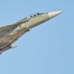 IAF Tejas Aircraft Suffers Landing Damage In Third Incident Since 2024 SEO DES: Reportedly, while returning from training mission the aircraft had a landing issue, veered off the runway but the pilot ejected safely without serious injuries SOCIAL: An Indian Air Force HAL Tejas Light Combat Aircraft sustained significant damage during a training sortie on February 7, 2026, after a landing issue led to a runway excursion. The pilot ejected safely without serious injuries, and no casualties were reported on the ground. The IAF has ordered a Court of Inquiry and initiated technical inspections across sections of the fleet, marking the third Tejas-related incident since 2024. The aircraft programme remains central to India’s combat fleet modernisation plans, including induction of the upgraded Mk1A variant. New Delhi, India: An Indian Air Force (IAF) HAL Tejas Light Combat Aircraft sustained significant damage during a training sortie on February 7, 2026, after encountering a problem while landing at a frontline air base, PTI reported. This marks the third incident involving a Tejas aircraft in recent years, following the March 2024 accident near Jaisalmer and the November 2025 Dubai Airshow crash. The aircraft had completed a routine training mission when it experienced an issue on approach and rollout, leading to a runway excursion. The pilot ejected safely as a precautionary measure and escaped without serious injuries. Authorities confirmed that the fighter suffered substantial damage to its airframe, though there were no reports of casualties on the ground. Following the incident, the IAF ordered a Court of Inquiry to determine the precise cause. Technical teams have begun detailed examinations of the aircraft’s systems, including landing and braking mechanisms, to establish whether the incident stemmed from a mechanical malfunction, systems anomaly, or another operational factor. As part of established safety protocols, the service has also initiated comprehensive checks across sections of the Tejas fleet to rule out any systemic concerns. The Tejas programme, developed and manufactured by Hindustan Aeronautics Limited (HAL), remains central to the IAF’s fleet modernisation efforts. The latest runway incident comes at a time when the force is progressing with induction plans for the upgraded Mk1A variant, even as production timelines and technical milestones remain under close review. Additionally, on February 5, 2026, industry reports confirmed that Hindustan Aeronautics Limited (HAL) did not progress to the next stage of India’s Advanced Medium Combat Aircraft (AMCA) stealth fighter programme after failing to clear the initial technical evaluation. This move marks a significant shift in the execution model of the project, which aims to deliver India’s first indigenous fifth-generation combat aircraft. This is the first occasion that HAL, a state-owned aerospace and defence manufacturer, will not lead or participate in the prototype phase of one of India’s flagship combat aircraft programmes, emphasising a strategic pivot toward private sector leadership in high-technology defence projects. Previous Incidents Involving Tejas March 12, 2024 – Near Jaisalmer, Rajasthan On March 12, 2024, a Tejas aircraft crashed during an operational sortie near Jaisalmer. The pilot ejected safely. The incident marked the first accident involving the aircraft since its induction into service and led to a technical investigation. November 21, 2025 – Dubai Airshow On November 21, 2025, a Tejas aircraft participating in an aerial display at the Dubai Airshow was involved in a fatal accident during a manoeuvre at low altitude. The pilot, Wing Commander Namansh Syal, was killed. A Court of Inquiry was instituted to investigate the circumstances surrounding the crash.