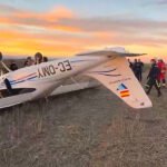 Small Training Aircraft Flips During Emergency Landing Near Madrid, Pilot Uninjured SEO DES: The aircraft operated by World Aviation Flight Academy had flown earlier without issues, authorities are probing the cause of the emergency landing SOCIAL: A Tecnam P2008JC light training aircraft overturned during an emergency landing near the M-407 road in Leganés, south of Madrid, on February 17. The 28-year-old trainee pilot escaped unhurt, and emergency responders confirmed there was no fire or fuel leakage. Crews from Emergencias 112, SUMMA 112, and local fire units secured the scene while Policía Local and Policía Nacional launched a preliminary investigation. The aircraft, operated by World Aviation Flight Academy and based at Cuatro Vientos Airport, had completed earlier flights without reported issues. Authorities are reviewing the cause of the emergency landing. No other occupants were onboard, and traffic in the area was largely unaffected. Madrid, Spain: A light training aircraft overturned during an emergency landing in a field near the M-407 road in Leganés, south of Madrid, on Tuesday evening, authorities confirmed. The pilot, a 28-year-old trainee, escaped without injury and first responders ruled out fire or fuel leakage at the scene. The incident unfolded shortly before 18:30 local time on February 17, when the single-engine plane, identified as a Tecnam P2008JC, was forced to make an unplanned descent to a clearing adjacent to the busy regional highway. The aircraft came to rest upside down after touching down, according to local emergency services. Emergency crews from Emergencias 112 Comunidad de Madrid, the SUMMA 112 medical service, and fire units responded promptly. The pilot was found conscious, oriented, and uninjured, and was subsequently evaluated by medical personnel as a precaution. Two fire crews conducted preventive measures to ensure there were no risks of ignition or hazardous spills, while officers from the Policía Local and Policía Nacional secured the perimeter and began a preliminary investigation into the circumstances that prompted the emergency landing. Video footage circulating from the site depicts the small plane resting inverted in the grass beside the road. The aircraft’s registration number and exterior logo indicate that it belongs to World Aviation Flight Academy, a flight training academy based at Cuatro Vientos Airport in Madrid. The aircraft is used by flight schools for pilot training and had completed earlier flights that day without reported issues. The exact cause of the emergency, whether mechanical malfunction or another operational factor, remains under review by the Policía Nacional’s aviation unit. No other individuals were reported to be aboard the aircraft at the time of the incident. Road traffic was not significantly disrupted, and neighbouring facilities, including a nearby industrial estate, remained unaffected.