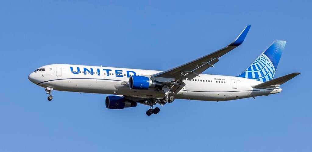 United Airlines Ferry Flight Diverts To Dublin After Mid-Atlantic Electrical Fault SEO DES: The crew detected a fault in the right engine’s IDG, switched to APU backup power, but cockpit electrical indications failed, raising reliability concerns SOCIAL: A United Airlines Boeing 767-300ER operating as ferry flight UA3907 from Munich to Newark diverted to Dublin on 15 February 2026 after an electrical system fault was detected mid-Atlantic. The issue involved the right engine’s Integrated Drive Generator, prompting the crew to switch to backup power and declare an emergency. The aircraft initially turned toward the UK before diverting to Dublin for operational and maintenance support. It landed safely without passengers onboard. The flight was cancelled on arrival. The aircraft is currently undergoing technical inspection before returning to service. Image: Acroterion (Wikimedia) Video: United Airlines Dublin, Ireland: A United Airlines Boeing 767-300ER operating as ferry flight UA3907 from Munich to Newark Liberty International Airport was forced to make an emergency diversion to Dublin Airport on 15 February 2026 after an electrical system fault emerged during the transatlantic segment of the flight. The aircraft, registration N657UA, was operating as a maintenance ferry flight repositioning the jet without passengers aboard when the crew detected a malfunction related to the right engine’s Integrated Drive Generator (IDG) shortly after reaching cruise altitude over the North Atlantic. The IDG is a key component that converts mechanical engine power into electrical energy for aircraft systems. After the fault was identified, the crew engaged the aircraft’s Auxiliary Power Unit (APU) to supply backup electrical power. However, cockpit indications of the aircraft’s electrical systems failed to display properly, raising concerns about the reliability of remaining systems. In accordance with international aviation procedures, the flight crew declared an emergency indicated by the universal Squawk 7700 transponder code and initially turned back toward the British Isles. Tracking data showed the aircraft initially set a diversion path toward London Heathrow but later altered course to Dublin, a decision likely influenced by operational considerations including maintenance support and logistical ease for aircraft recovery. The jet landed safely at Dublin Airport without incident and remained on the ground for technical inspection. According to flight records, the aircraft had been based at Munich Airport for several days prior to departure, where it underwent maintenance activity. The ferry flight was intended to return the aircraft to the United States for service deployment, but the electrical issue prevented the completion of that return journey. United Airlines confirmed that the flight was cancelled on arrival in Dublin and that the aircraft is being inspected by technical teams before any further operations. No injuries were reported, as there were no passengers on board.