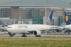 Kelsey, United States: The National Transportation Safety Board (NTSB) has released its final investigation report into the severe turbulence incident involving United Airlines Flight 1890, concluding that air traffic control failed to disseminate a critical pilot weather report that could have reduced the severity of the event. The Board said the aircraft encountered an unanticipated region of moderate-to-severe turbulence during descent into Newark Liberty International Airport, resulting in serious injuries to three flight attendants, while 277 other occupants were not injured. The incident occurred on February 10, 2024, when a Boeing 777-222ER, registered N788UA, was operating a scheduled domestic service from Los Angeles International Airport to Newark under Part 121 operations. While descending through approximately 21,500 feet (FL215) in instrument meteorological conditions, the aircraft encountered a localized pocket of turbulence that produced rapid vertical accelerations between 0.55 g and +1.82 g over several seconds. The sudden motion lifted unsecured crew members from the cabin floor and threw them into the ceiling and surrounding structures. Three flight attendants sustained serious injuries, including spinal fractures, a shattered femur, head trauma, and intracranial bleeding. Despite the injuries, the flight crew maintained control of the aircraft and continued to a safe landing at Newark, where emergency medical services met the aircraft at the gate. According to the report, the flight crew conducted standard preflight and in-flight turbulence assessments using Weather Services International (WSI) and SkyPath tools. Both systems showed only light to moderate turbulence along the planned route, and the onboard weather radar did not display any significant convective activity. Dispatch had advised the crew earlier in the flight that only one moderate turbulence report had been received from another regional jet descending into Newark, and no further warnings were issued as the aircraft approached the terminal area. Approximately three minutes before the incident, another aircraft, ACA548, reported moderate turbulence to Boston Air Route Traffic Control Center (ZBW ARTCC) while flying ahead of United 1890 on the same route near the Hancock VOR. That report was not acknowledged or passed on to the following aircraft. The NTSB determined that the probable cause of the accident was the aircraft’s encounter with a localized region of moderate-to-severe turbulence associated with strong upper-level wind shear and convective cloud tops. Contributing to the severity of the outcome, the Board found that air traffic control failed to disseminate the earlier pilot weather report, which reduced the flight crew’s situational awareness and limited their opportunity to seat cabin crew and secure the cabin before the encounter. Investigators stated that the controller handling the sector did not hear the initial turbulence report and therefore did not relay it, despite Federal Aviation Administration procedures requiring the solicitation and distribution of pilot weather reports during significant turbulence conditions. Meteorological analysis showed the presence of a cold front, embedded thunderstorms, and a strong jet stream with winds exceeding 110 knots near 21,000 feet, creating wind shear and clear-air turbulence at the tops of cloud layers. Satellite imagery and model data confirmed that turbulence conditions were present in the exact altitude band flown by the aircraft. The NTSB concluded that the flight crew followed proper procedures and used all available tools, but the most relevant real-time warning the pilot report issued minutes earlier was not provided to them, making the turbulence effectively unanticipated.