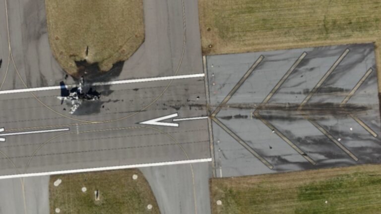 NTSB Preliminary Report Cites Unqualified Second-In-Command In Greg Biffle Plane Crash SEO DES: Just after takeoff, the jet began a left climb but the crew soon reported instrument issues. The left altimeter failed and airspeed & heading stopped SOCIAL: The NTSB released a preliminary report on the December 18, 2025 crash of a Cessna Citation 550 near Statesville, N.C., killing seven, including NASCAR champion Greg Biffle and his family. Shortly after takeoff, the crew reported instrument failures, including a faulty altimeter and loss of airspeed/heading data; Biffle was not flying. The jet struck a 29-foot approach light structure, towers, and trees while attempting a return; investigators found no structural or engine failures. North Carolina, United States: The National Transportation Safety Board (NTSB) has released a preliminary investigative report on the December 18, 2025 crash of a Cessna Citation 550 near Statesville Regional Airport, North Carolina, providing new detail into the flight’s final minutes and the sequence of technical and cockpit challenges that preceded the accident. The accident claimed the lives of seven people, including former NASCAR champion Greg Biffle, his wife Cristina, their two children, and three others. According to the NTSB’s preliminary report, the Citation departed Statesville at approximately 10:06 a.m. Eastern on a personal flight to Sarasota, Florida, under visual flight rules. The aircraft, registered to a company linked to Biffle, lifted off fully fueled with seven people aboard. Before takeoff, cockpit voice recordings captured the crew discussing a malfunctioning thrust reverser indicator light, although the thrust reversers themselves appeared operational. Just after departure, the aircraft started a left climbing turn, but soon after the crew reported a series of in-flight instrument anomalies. The left-side altimeter was reported not functioning properly, and data from the Garmin navigation system showed that airspeed and heading information stopped recording. The autopilot also disengaged about the same time, though it was unclear whether that was intentional. The NTSB confirmed that Greg Biffle was not at the controls of the aircraft when it crashed. The jet was being flown by Dennis Dutton, a retired airline pilot with multiple type ratings, seated in the left seat. His son, Jack Dutton, was in the right seat handling communications and checklists. While both men held pilot certificates, the report noted that the right-seat occupant was not qualified to serve as second-in-command (SIC) on this type of aircraft, a requirement under Federal Aviation Administration rules for that Citation model under normal operations. Neither Biffle nor Jack Dutton had the appropriate SIC endorsement, though Dutton was the pilot flying at the time of the accident. Data indicates that after reporting the instrument problems, the aircraft climbed to around 4,500 feet before the pilot briefly handed control to the right-seat occupant while troubleshooting continued. During this time, the crew attempted to activate an instrument flight rules clearance but experienced difficulty reaching air traffic control. The aircraft began a descent back toward the airport. The pilot and crew reported visually acquiring the runway environment and began configuring the plane for landing. The pilot called for flaps and landing gear extension, but landing gear indicator lights did not illuminate, suggesting electrical or indication issues. At one point on the final approach, the right-seat occupant broadcast on the airport’s common traffic advisory frequency: “We’re having some issues here.” Radar and limited flight data show the aircraft rolled out on runway heading at approximately 1,240 feet altitude and 114 knots, but both altitude and airspeed began to decay steadily as the jet continued toward the runway threshold. The plane struck a 29-foot approach light structure about 1,380 feet short of the runway, then impacted additional light towers and trees before skidding into the runway overrun area. A fire destroyed much of the fuselage. Investigators found no indication of structural failure or engine malfunction prior to impact. Both engines remained attached to the airframe, and fan blade damage was consistent with rotation at the moment of ground impact. The aircraft was not required to have a flight data recorder. Investigators recovered the cockpit voice recorder (CVR), extracting roughly 31 minutes of audio, although poor audio quality complicated parts of the review. Limited avionics data was recovered from the Garmin unit. The NTSB’s preliminary report outlines factual information about the sequence of events but does not assign probable cause. That determination, along with any contributing factors and safety recommendations, will be part of a final report, typically issued 12 to 18 months after an accident.