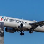 American Airlines Flight Makes Emergency Return To Barbados Post Burst Tyre On Takeoff SEO DES: The crew reported a landing gear alert linked to a burst tyre and entered a holding pattern to allow runway inspection and emergency services to prepare SOCIAL: An American Airlines Boeing 737-823 operating Flight AA1284 from Bridgetown to Miami made an emergency return to Grantley Adams International Airport shortly after takeoff due to a tyre failure. The aircraft, carrying 134 passengers, circled offshore while crews prepared for landing and runway inspections. The flight landed safely with no injuries, and aviation authorities are awaiting a technical report from the airline. Emergency services were placed on standby as a precaution, and the aircraft remained grounded for maintenance checks. Passengers were accommodated at the terminal while alternative travel arrangements were made. Image: Acroterion (Wikimedia) Video: American Airlines Bridgetown, Barbados: An American Airlines Boeing 737-823, operating Flight AA1284 from Bridgetown to Miami, was forced to make an emergency return to Grantley Adams International Airport (BGI) shortly after departure on Tuesday morning due to a tyre failure during takeoff, airport authorities confirmed. The aircraft, carrying 134 passengers, departed BGI at approximately 7:00 a.m. local time. Moments after liftoff, the flight crew reported an abnormal indication related to the aircraft’s landing gear system, which was later confirmed to be linked to a burst tyre. As a precautionary measure, the pilots entered a holding pattern over the Caribbean Sea to allow ground teams to inspect the runway for debris and prepare emergency services for a possible abnormal landing. According to Hadley Bourne, Chief Executive Officer of Grantley Adams International Airport, emergency response units, including airport fire services, security personnel, and air traffic controllers, were immediately placed on standby. “The aircraft landed safely and passengers were returned to the terminal. There were no injuries,” Bourne told Barbados Today. Flight-tracking data showed AA1284 circling offshore for nearly 30 minutes before making a controlled return and landing on the same runway from which it had departed. The aircraft taxied to a remote stand, where passengers disembarked normally. The Civil Aviation Authority (CAA) of Barbados said it had received a preliminary notification from airport operations confirming the tyre issue and was awaiting a full technical report from American Airlines. CAA Director-General Tracey Forde-Bailey said the regulator would review the airline’s maintenance findings as part of standard post-incident procedures. “At this stage, we have received the initial report that the aircraft returned safely following a tyre-related issue. Further technical details will follow once the airline completes its inspection,” she said. American Airlines has not issued a detailed public technical statement, but airport officials confirmed that the aircraft experienced a tyre failure during takeoff, which triggered cockpit warnings and required an immediate inspection.