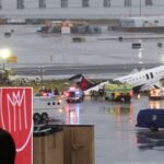 Air Canada CEO To Step Down After English-Only Video Backlash After New York Collision SEO DES: Over 2,000 complaints filed with Canada’s Official Languages Commissioner, as Quebec’s Assembly demanded his resignation & a parliamentary panel summoned him SOCIAL: Michael Rousseau will step down as CEO of Air Canada after backlash over an English-only condolence video following a fatal runway collision at LaGuardia Airport involving Air Canada Express Flight 8646 that killed two pilots and injured 41 people. The video, lacking French despite Canada’s bilingual requirements under the Official Languages Act, sparked outrage in Quebec, drew criticism from Mark Carney and François Legault, and led to over 2,000 complaints, a Quebec Assembly motion, and a parliamentary summons. Rousseau apologised, admitting the issue overshadowed the tragedy, but the incident along with past criticism over not speaking French ultimately led to his planned exit by late 2026, with Air Canada now prioritising bilingual leadership. Montreal, Canada: Michael Rousseau, President and Chief Executive Officer of Air Canada, will step down later this year following intense backlash over an English-only condolence video issued after a fatal runway collision involving an Air Canada Express flight at LaGuardia Airport. The airline confirmed that Rousseau will retire by the end of the third quarter of 2026, a move widely viewed as directly linked to the controversy despite being officially described as part of a succession plan. The controversy stems from the March 22 accident involving Air Canada Express Flight 8646, which had departed Montreal and collided with an airport fire truck after landing in New York. The crash killed both pilots identified as Antoine Forest and Mackenzie Gunther and left 41 people injured. Investigations are being led by U.S. authorities with support from Canadian agencies, as scrutiny intensifies around runway safety and ground coordination. In the aftermath, Rousseau released a video expressing what he described as his “deepest sorrow for everyone affected.” However, the message was delivered almost entirely in English, with only two French words “bonjour” and “merci” while French subtitles were provided. The response triggered widespread outrage in Quebec and across French-speaking Canada, where language remains a politically and culturally sensitive issue. The fallout quickly escalated into a political issue. Canadian Prime Minister Mark Carney criticised the message, calling it a lack of “judgment” and “compassion.” Quebec Premier François Legault and other leaders also condemned the video, with calls for Rousseau’s resignation intensifying. Over 2,000 complaints filed with Canada’s Official Languages Commissioner. A unanimous motion in Quebec’s National Assembly demanding his resignation and a parliamentary committee summoning Rousseau to testify in Ottawa. The incident reignited long-standing tensions around bilingualism and corporate responsibility in Canada, particularly in Quebec. Air Canada, despite being a publicly traded company, is subject to Canada’s Official Languages Act, which requires it to communicate in both English and French. The airline’s failure to meet these expectations in a moment of national mourning drew sharp criticism, with observers noting that language in Canada is closely tied to identity and political history. Facing mounting criticism, Rousseau issued a formal apology, stating he was “deeply saddened” that his inability to speak French had diverted attention from the victims and their families. He acknowledged that the controversy overshadowed the tragedy and affected public trust in the airline’s leadership. The incident also revived scrutiny over Rousseau’s past remarks and leadership record. In 2021, shortly after becoming CEO, he drew backlash for delivering speeches in English in Montreal and stating he had lived in the city for years without learning French. These earlier comments contributed to perceptions that the latest controversy reflected a broader pattern rather than an isolated misstep. While Air Canada stated that Rousseau’s departure is part of a planned retirement and succession process, the timing has drawn clear links to the crisis. The airline has confirmed that Rousseau will remain until late 2026 and the search for a successor will prioritise bilingual leadership. The company also faced short-term reputational and market pressure, including a temporary dip in its stock following the announcement.