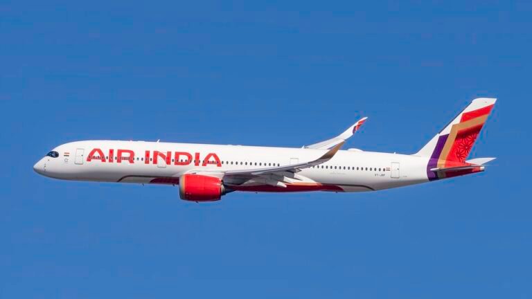 Air India Flight Returns To Delhi After Mid-Air Technical Snag; DGCA Launches Probe SEO DES: Crew reported non-specific vibrations and unusual noise from the belly area while cruising over Oman/Saudi airspace, prompting precautionary action SOCIAL: An Air India Airbus A350-900 operating flight AI111 from New Delhi to London returned mid-air after suspected technical issues, including vibrations and unusual noise. The aircraft remained airborne for nearly seven hours before landing safely, with no injuries reported. The same aircraft (VT-JRF) had a similar incident earlier in March, prompting India’s aviation regulator, Directorate General of Civil Aviation, to launch an investigation into the recurring issue. Image: Mark Bess (Flickr) Video: Air India New Delhi, India: An Air India Airbus A350-900 operating flight AI111 from Delhi to London Heathrow was forced to return to its origin after a suspected technical issue was detected mid-air, marking the second such incident within 10 days. The aircraft, registered VT-JRF, took off from Indira Gandhi International Airport early Thursday morning and remained airborne for nearly seven hours before safely landing back in Delhi. According to airline and regulatory sources, the flight crew reported non-specific vibrations and unusual noise, particularly from the aircraft’s belly or cargo hold area, while the aircraft was cruising over Oman/Saudi Arabian airspace. Despite normal cockpit instrument readings, the pilots opted for a precautionary return in line with safety protocols. Air India confirmed that the decision was taken “in an abundance of caution” after a suspected technical issue was identified. The aircraft had departed Delhi around 5:42–6:13 AM and returned at approximately 12:30–1:20 PM, after covering nearly 3,000+ km before turning back. Air India confirmed that the aircraft landed safely, and all passengers and crew onboard were unharmed. The airline stated that the aircraft is undergoing extensive technical inspections, and reiterated that passenger safety remains its top priority. Passengers were provided assistance, including refreshments and arrangements for onward travel. This is the second time in less than two weeks that aircraft VT-JRF has experienced similar issues. On March 15, the same aircraft, operating flight AI102 (New York–Delhi), was diverted to Shannon, Ireland, after passengers reported floorboard vibrations and noise from below the cabin. Around 300 passengers were onboard during that incident, and the aircraft landed safely. India’s aviation regulator, the Directorate General of Civil Aviation (DGCA), has launched a formal investigation into the incident. Officials from the airworthiness and air safety directorates are examining the aircraft and the recurring nature of the issue.