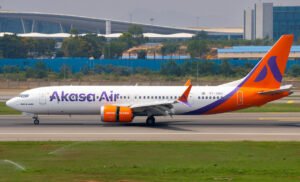 Passenger Charged For Smoking In Lavatory On Delhi-Goa Akasa Air Flight SEO DES: Passenger was found carrying a lighter, posing a potential fire risk onboard; The violation was detected during the flight & followed safety procedures SOCIAL: A passenger has been charged after allegedly smoking a beedi inside the lavatory of an Akasa Air flight from Delhi to Goa on March 7, 2026. The passenger was also found carrying a lighter, raising safety concerns. After the aircraft landed at Manohar International Airport. Police registered a case under the Bharatiya Nyaya Sanhita and the Suppression of Unlawful Acts Against Safety of Civil Aviation Act, 1982, and an investigation is underway. Image: Krish Aarush (Flickr) Video: Akasa Air Goa, India: A passenger has been charged after allegedly smoking a beedi (hand-rolled cigarette) inside the lavatory of an Akasa Air flight travelling from Delhi to Goa, raising serious safety concerns during the flight. Authorities registered a case following the aircraft’s arrival at Goa’s Manohar International Airport (Mopa), officials said. The incident occurred on March 7, 2026, on Akasa Air flight QP1625 operating from Delhi to Goa. According to police and airline officials, the passenger identified as Ashish, a resident of Delhi allegedly went to the aircraft lavatory during the flight and smoked a beedi, a hand-rolled tobacco cigarette. Airline authorities later reported that the passenger was also found carrying a lighter, which investigators said could pose a potential fire hazard inside an aircraft cabin. Officials noted that the act endangered the safety of passengers and crew members, as smoking and open flames are strictly prohibited onboard commercial flights. Crew members detected the violation during the flight and followed established safety procedures. In a statement, Akasa Air confirmed the incident, stating: “A passenger travelling on Akasa Air flight QP1625 from Delhi to Goa on March 7 was found smoking in the aircraft lavatory.” The airline said its crew adhered to all regulatory and safety protocols and handed the passenger over to authorities immediately after the aircraft landed in Goa. The carrier also confirmed it is cooperating fully with investigators. Following the complaint, Mopa Airport Police registered a case against the passenger under Section 125 of the Bharatiya Nyaya Sanhita (BNS) for acts endangering life or personal safety. Authorities also invoked Section 3(1)(C) of the Suppression of Unlawful Acts Against Safety of Civil Aviation Act, 1982, which addresses actions that threaten aviation safety. Police said the accused has been served a notice under the relevant provisions of the law, and further investigation into the incident is underway.