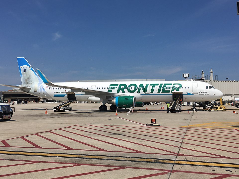 Frontier Flight Makes Emergency Landing After Bomb Threat, Triggers Major ATL Response SEO DES: Investigation found the bomb threat was not credible, prompting authorities to downgrade it from a hijacking scare to an unruly passenger case SOCIAL: A Frontier Airlines flight from Columbus to Hartsfield–Jackson Atlanta International Airport triggered a major security response after a passenger claimed there was a bomb onboard and threatened another traveler while the aircraft was taxiing after landing. The crew alerted ATC, prompting authorities to treat the situation as a potential hijacking and move the aircraft to an isolated area, where passengers were safely deplaned. A subsequent search found no explosives, and the incident was downgraded to an unruly passenger case, with the individual detained and facing federal investigation. Image: Griz13 (Wikimedia) Video: Frontier Airlines Atlanta, United States: A Frontier Airlines flight arriving from Columbus, Ohio, triggered a major security response at Hartsfield–Jackson Atlanta International Airport after a passenger made a bomb threat claim and issued violent remarks, prompting authorities to initially treat the situation as a potential hijacking. Frontier Airlines Flight F9-2539, operated by an Airbus A320, had completed its scheduled service from Columbus and landed safely in Atlanta at approximately 5:00 PM local time. The situation escalated shortly after touchdown while the aircraft was taxiing to its assigned gate. According to multiple reports and air traffic control communications, a passenger onboard began behaving aggressively, claiming there was a bomb on the aircraft and threatening to kill a fellow passenger seated next to him. The severity of the claims led the flight crew to immediately alert air traffic control, triggering a high-level security response. Despite the aircraft already being on the ground, the nature of the threat, specifically the mention of an explosive device and direct threats to passenger safety meant the situation was handled under protocols typically reserved for suspected hijacking or terrorism-related incidents. In aviation security procedures, any bomb threat is treated as credible until proven otherwise. Following the alert, the aircraft was diverted away from the terminal and directed to a remote isolation area on the airfield. Law enforcement agencies, including airport police and federal authorities, quickly surrounded the aircraft. Passengers were deplaned using mobile stairs instead of a jet bridge and were transported to the terminal by buses, allowing authorities to conduct safety checks and ensure the situation was fully contained. Frontier Airlines stated that the measures were taken as a precaution in coordination with local authorities. The aircraft remained isolated for a period while security personnel conducted a thorough inspection. Subsequent investigation determined that the bomb threat was not credible, and no explosive device was found onboard. Authorities downgraded the situation from a potential hijacking to an unruly passenger incident. The individual responsible for the threat was detained, and the case has been taken up by federal agencies for further investigation. Under U.S. law, making a false bomb threat carries severe penalties, including significant prison time. The Federal Aviation Administration reports that unruly passenger incidents surged to record levels in 2021, with nearly 6,000 cases recorded, but have since declined by over 80%, although disruptive behaviour continues to persist. In 2024 alone, airlines reported more than 1,240 incidents, including 915 cases within the first half of the year, highlighting that the issue remains ongoing despite improvements. The FAA investigates cases involving violations such as assault, threats, or interference with crew duties, and can impose fines of up to $43,658 per violation, with serious cases referred to the FBI for criminal prosecution. Overall, while the frequency of incidents has reduced significantly from pandemic-era highs, the data indicates that unruly passenger behaviour continues to pose a safety concern in commercial aviation.