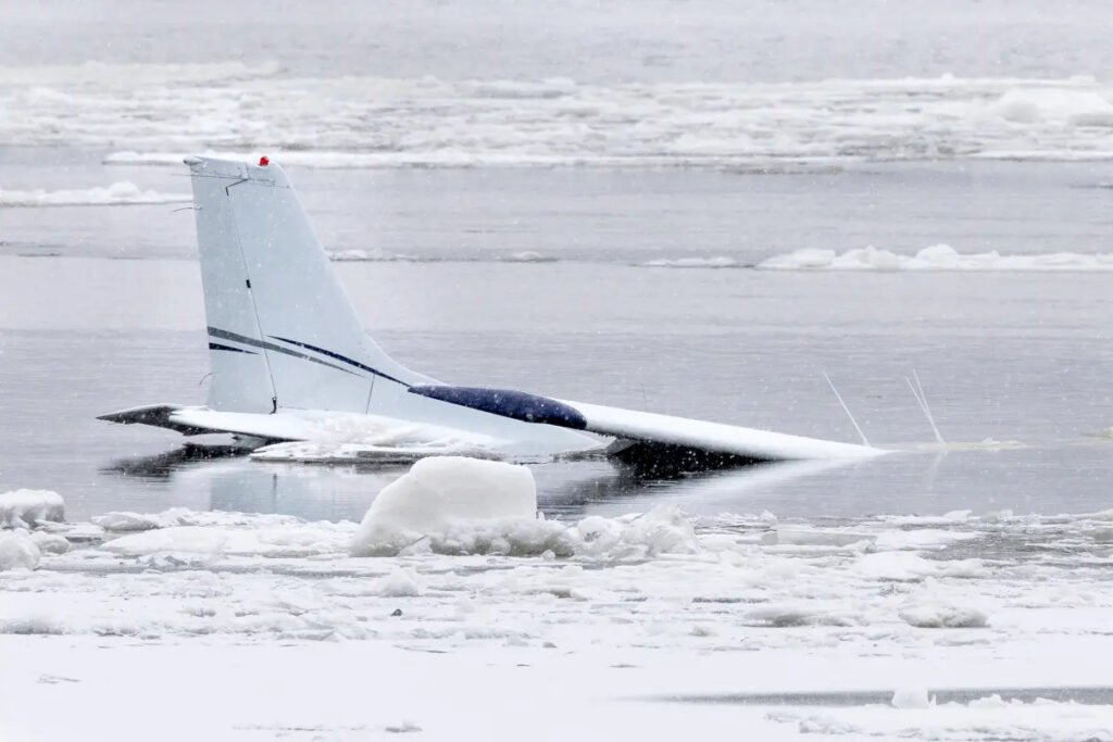 Engine Failure Forces Hudson River Crash Landing; Instructor, Student Swim to Safety SEO DES: The flight instructor declared an emergency and landed on an ice-covered river about 200 feet from shore, and he & his 17-year-old student swam safely to land SOCIAL: A Cessna 172 Skyhawk operating a night training flight from Long Island MacArthur Airport made an emergency landing on the Hudson River after suffering engine failure near the United States Military Academy. The aircraft had earlier conducted a stop-and-go maneuver at Stewart International Airport before mechanical trouble developed on the return leg. Flight instructor Liam Darcy, who teaches at Long Island Flying, declared an emergency and guided the plane onto an ice-covered section of the river about 200 feet from shore. Darcy and his 17-year-old student exited the aircraft and swam to safety. Both were treated for minor injuries and released. The Federal Aviation Administration and the National Transportation Safety Board are investigating the cause of the engine failure. New York, United States: New details have been recovered from the Hudson River training aircraft crash near Newburgh, providing further clarity on the emergency water landing that saw a flight instructor and his teenage student bring their aircraft down on an icy stretch of water Monday night. The aircraft involved was a Cessna 172 Skyhawk conducting a scheduled night training flight from Long Island MacArthur Airport. Authorities said the plane departed MacArthur Airport at approximately 6:30 p.m. for a routine instructional flight. On board were 31-year-old certified flight instructor Liam Darcy and his 17-year-old student pilot. The flight continued north and performed a stop-and-go maneuver at Stewart International Airport around 7:30 p.m. Shortly after departing Stewart on the return leg, the aircraft began experiencing mechanical trouble near the United States Military Academy, officials said. Darcy took control of the aircraft and declared an emergency as the engine began losing power. When it became clear the aircraft could not reach the airport, he elected to attempt an emergency landing on the Hudson River. The aircraft touched down on an ice-covered section of the river roughly 200 feet from the western shoreline near Newburgh. Both occupants exited the aircraft and swam through frigid water to reach shore. They were later treated for minor injuries and released. Darcy is a flight instructor with Long Island Flying, where he has been instructing the 17-year-old student for approximately a year and a half. The flight was part of structured night training. Air traffic control audio captured from Stewart tower documented the escalating emergency, including the pilot’s transmission that they would not make the airport and were diverting to the river. Preliminary findings indicate the engine lost power completely, forcing the aircraft into a glide before the controlled water landing. The Federal Aviation Administration and the National Transportation Safety Board are investigating the cause of the engine failure. Authorities have stated there is no indication of impairment or criminal activity, and a mechanical examination of the aircraft remains ongoing.