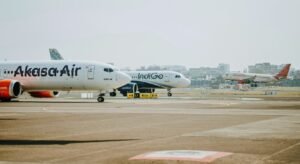 India Approves $3Bn Aviation Push, Plans 100 New Airports Under Revamped UDAN Scheme SEO DES: Plan adds heliports, airline subsidies and upgrades to boost connectivity, targeting 350-400 airports by 2047 as India strengthens its aviation growth SOCIAL: India has approved a $3.06 billion (₹28,840 crore) aviation expansion to develop 100 new airports under the UDAN scheme over the next decade. The plan includes heliports, subsidies for airlines, and infrastructure upgrades to boost regional connectivity, with a target of 350-400 airports by 2047 as India strengthens its position as a fast-growing global aviation market. The initiative will improve access to air travel in remote and underserved regions, while supporting airlines through viability gap funding. It is also expected to drive economic growth, tourism, and job creation across the country. New Delhi, India: India has approved a sweeping expansion of its aviation sector, committing approximately $3.06 billion (₹28,840 crore) to strengthen regional air connectivity and develop 100 new airports under a revamped version of its flagship Ude Desh ka Aam Nagrik (UDAN) which translates to "Let the common citizen of the country fly” scheme. The decision, cleared by the Union Cabinet, will see the programme implemented over a 10-year period from FY2026–27 to FY2035–36, marking one of the country’s most significant aviation infrastructure initiatives till date. The government will develop 100 airports from currently unserved and underserved airstrips, targeting improved connectivity across Tier-2 and Tier-3 cities, as well as remote, hilly, and island regions. In addition, the plan includes: 200 new heliports/helipads to enhance last-mile connectivity Expansion of aviation access in difficult terrains and emergency-response zones Officials said the initiative aims to make air travel more accessible while unlocking regional economic potential. The ₹28,840 crore outlay includes multiple funding components designed to address both infrastructure and operational challenges: ₹12,159 crore for airport development (CAPEX) over eight years ₹10,043 crore in viability gap funding (VGF) to support airlines on unprofitable routes ₹2,577 crore allocated for operation and maintenance (O&M) of around 441 aerodromes Development of heliports at an estimated ₹3,661 crore The government will also support fleet expansion under its self-reliance initiative, including procurement of HAL Dhruv helicopters and Dornier aircraft for regional operations. Launched in 2016, UDAN was designed to make flying affordable and expand connectivity to smaller cities. The scheme has already delivered measurable results: 663 routes operationalised 95 airports, heliports, and water aerodromes added Over 162 lakh (16.2 million) passengers carried More than 3.41 lakh flights operated The next phase is expected to significantly scale this impact, with the government estimating benefits for around 4 crore passengers. India currently has around 163 operational airports, up from 70 in 2014, reflecting rapid infrastructure expansion over the past decade. The government now aims to increase this number to 350–400 airports by 2047, positioning the country as a major global aviation hub. Authorities view aviation as a key driver of: Economic growth Job creation Tourism and regional development At the same time, the policy addresses persistent sector challenges, including inadequate infrastructure and high operating costs, by combining infrastructure investment with airline subsidies. The latest expansion shows India’s position as the world’s fastest-growing aviation market, with demand expected to surge in the coming decades.