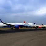 India Aviation Sector Losses Cross ₹24,000 Crore In 3 Years; ₹10,000 Crore More Likely SEO DES: Govt said post-1994 deregulation, airlines independently manage operations and finances based on market conditions without direct government control SOCIAL: India’s aviation sector reported ₹24,819 crore in losses over FY2022–23 to FY2024–25, the government informed Parliament. Losses were ₹18,606.78 crore in FY2022–23, ₹924.39 crore in FY2023–24, and ₹5,289.73 crore in FY2024–25 (provisional). The Ministry of Civil Aviation said the data was based on airline submissions. It also noted industry estimates of ₹9,500–₹10,500 crore additional losses in FY2025–26. The government reiterated that the sector is deregulated, with airlines independently managing operations and pricing, which depends on factors like fuel cost, demand, and capacity. New Delhi, India: India’s aviation sector has incurred cumulative losses of ₹24,819 crore over a three-year period from FY2022–23 to FY2024–25, the government informed the Rajya Sabha, reflecting continued financial strain across the industry. Minister of State for Civil Aviation Murlidhar Mohol, in a written reply, said the loss figures were based on data submitted by scheduled airline operators. According to the government, airlines reported losses of ₹18,606.78 crore in FY2022–23, which sharply narrowed to ₹924.39 crore in FY2023–24, before rising again to ₹5,289.73 crore (provisional) in FY2024–25, taking the total losses over the three financial years to ₹24,819 crore. The information was provided in response to a parliamentary query seeking details on the financial performance of the aviation sector, including loss trends and future outlook. The query also cited industry estimates suggesting that airlines could incur further losses in the range of ₹9,500 crore to ₹10,500 crore in FY2025–26, indicating that financial pressures may persist despite fluctuations in yearly performance. The government reiterated that the aviation sector operates in a deregulated environment following the repeal of the Air Corporations Act in March 1994, allowing airlines to independently take financial and operational decisions based on market conditions. It noted that aspects such as resource mobilisation, capacity planning and restructuring are managed by airlines on commercial considerations without direct government control. On airfare pricing, the minister said ticket rates are not regulated and are determined by airlines depending on several factors, including seat occupancy, fuel costs, aircraft capacity and seasonal demand. This dynamic pricing mechanism enables carriers to adjust fares in response to changing market conditions. Addressing cost structures, the government stated that the price of Aviation Turbine Fuel has been market-determined since April 1, 2001. ATF currently attracts 11 per cent central excise duty, while a reduced rate of 2 per cent applies to flights operating under the Regional Connectivity Scheme. In addition, state governments and Union Territories levy Value Added Tax on ATF at varying rates. Despite the deregulated framework, airlines continue to operate under regulatory oversight and are required to comply with provisions laid down under the Aircraft Rules, 1937, as well as civil aviation requirements issued by the Directorate General of Civil Aviation.