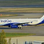 New Delhi, India: An IndiGo flight operating from Visakhapatnam to Delhi made a safe emergency landing at Indira Gandhi International Airport on Saturday morning after suffering a mid-air engine failure. The flight, identified as 6E579, was carrying 160 passengers onboard, sources told PTI though a detailed passenger-crew breakup has not been officially disclosed by the airline. The aircraft encountered a failure in one of its engines during the flight, prompting the pilots to initiate emergency procedures and seek priority landing clearance in Delhi. Despite the technical issue, the crew continued operations using the aircraft’s remaining engine, in line with standard safety protocols for twin-engine jets. Airport authorities declared a full emergency at 10:39 AM, activating all necessary response mechanisms. The aircraft subsequently landed safely at approximately 10:54 AM on Runway 28, with fire tenders and rescue teams positioned on standby as a precaution. The aircraft involved was a Boeing 737, approximately 15 years old, operating under a wet-lease arrangement from Corendon Airlines. Under such agreements, the leasing airline typically provides the aircraft along with crew and maintenance support. All passengers and crew onboard the flight were reported safe, with no injuries or damage recorded. Following the landing, emergency status at the airport was withdrawn, and operations continued without significant disruption. The airport operator of Delhi International Airport Limited (DIAL) confirmed that standard emergency protocols were followed to ensure a safe and controlled landing environment.