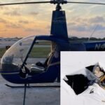 Instructor & Student Killed In Florida Helicopter Crash After Mid-Air Engine Trouble SEO DES: Robinson R44 from Palm Beach Helicopters was on a training flight; ATC audio revealed that the pilot attempted emergency landing moments before losing contact SOCIAL: A training flight in Boynton Beach, United States ended in tragedy after a helicopter suffered engine trouble mid-air and crashed into a warehouse, killing a 28-year-old instructor and a 52-year-old student. Air traffic control audio revealed the pilot attempted an emergency landing moments before losing contact. The aircraft, a Robinson R44 operated by Palm Beach Helicopters, went down around 12:30 p.m. Authorities, including the National Transportation Safety Board and Federal Aviation Administration, are investigating, with early indications pointing to a possible engine malfunction. Boynton Beach, United States: A fatal helicopter crash in Boynton Beach, Florida, has claimed the lives of a flight instructor and a student pilot after the aircraft experienced engine trouble mid-flight, according to authorities and newly obtained air traffic control recordings. Investigators confirmed that the victims were 28-year-old instructor Alejandro Carrasco of West Palm Beach and 52-year-old student Bryan Menna of Michigan, who were on board a training flight at the time of the accident. According to air traffic control audio reviewed by investigators, the pilot reported a developing issue shortly before the crash. In the transmission, the pilot indicated that the helicopter was experiencing a problem and that an emergency landing in a nearby field was being attempted. "We're going to land here, in one of these fields; we have a problem with the helicopter," a person on board said in the 43-second radio call obtained this Tuesday. Apparently, someone who was listening didn't hear what was said, and another person can be heard explaining the situation. "He said he's going to land in one of the fields; there's a problem with the engine," the other person says. The communication lasted less than a minute before contact was lost. The helicopter subsequently crashed into the roof of a warehouse near South Congress Avenue at approximately 12:30 p.m., as confirmed by the Federal Aviation Administration (FAA). Aerial footage from the scene showed parts of the helicopter lodged in the building’s structure, showcasing the force of the impact. Witnesses reported seeing fluid leaking from the wreckage, though no post-crash explosion occurred. Emergency responders quickly secured the area, and access to nearby facilities remained restricted as authorities began their investigation. The National Transportation Safety Board (NTSB) has taken the lead in determining the cause of the crash, with assistance from the FAA. Early indications point toward a possible engine malfunction, though officials have not yet confirmed a definitive cause. The aircraft involved was identified as a Robinson R44 helicopter, a commonly used model for training flights. FAA records showed that the helicopter belongs to Palm Beach Helicopters, a flight school in Lantana. Authorities said investigators from the National Transportation Safety Board are expected to provide more details about the cause in coming weeks.