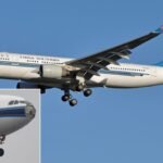 China Southern A330 Jet Hit By A Bird Strike, Loses Nose Radome After Shanghai Takeoff SEO DES: Impact hit the radome, tearing it off; images show exposed radar dish with nose parts missing or hanging loose, showing the severity of the strike SOCIAL: A China Southern A330 suffered a severe bird strike after takeoff from Shanghai on March 21, 2026, losing its nose radome and forcing an emergency return. The crew declared an emergency, held at low altitude, and landed safely with no injuries. Passengers were rebooked as the aircraft was withdrawn for inspection, causing temporary disruption. The impact likely involved a large bird or flock during the critical climb phase, causing extensive nose damage. The incident highlights the risks of bird strikes despite established aviation safety measures. Image: Jules Meulemans (Wikimedia) Shanghai, China: A China Southern Airlines Airbus A330 was forced to make an emergency return shortly after departure from Shanghai following a dramatic bird strike that caused extensive damage to the aircraft’s nose section. The incident occurred on March 21, 2026, involving flight CZ3554, which had departed from Shanghai Hongqiao International Airport bound for Shenzhen. The widebody aircraft, identified as an Airbus A330-343 (registration B-1062), encountered a bird strike during its initial climb, leading to the near-total loss of its nose and radome, the protective structure housing the aircraft’s weather radar. According to flight data and multiple reports, the aircraft struck either a large bird or a flock shortly after takeoff, at a relatively low altitude during a critical phase of flight. The impact was concentrated on the radome, a composite component designed to be lightweight and radar-transparent, which was severely compromised and largely torn away. Images circulating online showed the aircraft on the ground with its radar dish fully exposed and sections of the radome missing or hanging loose, showcasing the intensity of the impact. Following the strike, the flight crew halted the climb and initiated standard emergency procedures. The pilots declared an emergency with air traffic control and executed an air turn-back, opting to return to Shanghai rather than continue the flight to Shenzhen. Flight tracking data indicates the aircraft maintained a relatively low altitude before entering a holding pattern near the departure airport. It subsequently landed safely at Shanghai Hongqiao at approximately 10:45 AM local time, with no reported injuries among passengers or crew. All passengers and crew disembarked safely after landing. China Southern Airlines activated its emergency response procedures, arranging alternative travel for affected passengers, including a replacement aircraft to continue the journey to Shenzhen later the same day. The incident caused temporary disruption at Shanghai Hongqiao Airport, requiring operational adjustments as the damaged aircraft was removed from service for inspection and repairs.