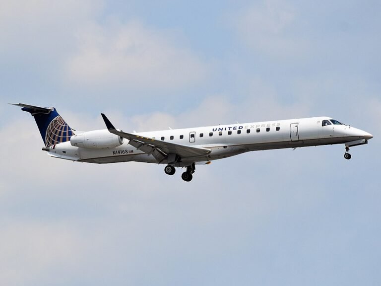 United Express Flight Diverts After Mid-Air Engine Failure, No Injuries Reported SEO DES: The issue involved the aircraft’s left engine, with no fire alert; the flight carrying 37 passengers and crew landed safely, with no injuries reported SOCIAL: A United Express flight operated by CommuteAir diverted to Jackson after a mid-air engine failure en route from Knoxville to Houston. The crew shut down the affected left engine and followed standard safety procedures. The aircraft landed safely and taxied to the gate, allowing passengers to disembark normally. The flight was carrying 37 passengers and crew, with no injuries reported. Passengers were later rebooked while the aircraft was withdrawn for technical inspection. Image: Adam Moreira (Wikimedia) Video: United Airlines Jackson, United States: A United Express regional flight bound for Houston was forced to make an emergency diversion to Mississippi on Monday after experiencing an engine failure mid-flight, according to airline and airport officials. The aircraft, CommuteAir flight 4302 operating as United Express, was en route from Knoxville, Tennessee, to George Bush Intercontinental Airport in Houston when the crew detected a malfunction in one of the engines. According to officials, the issue involved the aircraft’s left engine, which prompted the pilots to initiate standard safety procedures and divert the flight to Jackson-Medgar Wiley Evers International Airport. The aircraft landed safely in Jackson at approximately 11:40 a.m., just minutes after the issue was reported. It subsequently taxied to the gate under its own power, allowing passengers to disembark normally. A statement from the airline confirmed that one engine had shut down during the flight, but there were no indications of fire and the situation was handled in accordance with established safety protocols. The flight was carrying 37 passengers and crew, all of whom were safely evacuated with no injuries reported. Airport operations teams and maintenance personnel conducted inspections of both the aircraft and runway following the landing, with no immediate issues identified. Passengers were later rebooked onto alternative flights to continue their journey to Houston, while the affected aircraft were withdrawn for further technical evaluation. Flight tracking data indicated that the diversion occurred mid-route, consistent with standard operating procedures in the event of an in-flight engine anomaly.