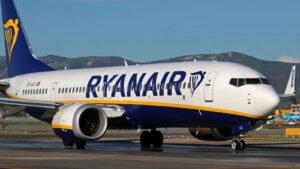 UK Probes Ryanair 737 Flight Low-Fuel Landing After Multiple Diversions At Manchester SEO DES: The aircraft declared a fuel emergency & landed with about 220 kg of fuel with roughly five to six minutes of flight time remaining. No injuries were reported SOCIAL: A Ryanair Boeing 737-800 (flight FR3418) flying from Pisa, Italy to Glasgow Prestwick diverted and landed at Manchester Airport on October 3, 2025, after severe weather forced multiple aborted landing attempts. The aircraft declared a fuel emergency and landed with about 220 kg of fuel with roughly five to six minutes of flight time remaining. The Air Accidents Investigation Branch has opened an investigation into the incident; no injuries were reported. The flight had attempted landings at Glasgow Prestwick Airport and Edinburgh Airport before diverting due to strong winds and turbulence. Investigators are reviewing flight data, weather conditions and fuel planning procedures while the airline says it is cooperating with authorities. Manchester, United Kingdom: A serious aviation incident involving a Ryanair passenger jet that landed with only minutes of fuel remaining in October 2025 is now under investigation by UK aviation authorities. The incident occurred on October 3, 2025, when Ryanair flight FR3418, a Boeing 737-800 operated by Malta Air, was flying from Pisa, Italy, to Glasgow Prestwick Airport in Scotland. Severe weather linked to Storm Amy forced the aircraft to abandon multiple landing attempts before diverting to Manchester Airport, where it eventually landed safely. According to flight data and aviation reports, the crew attempted to land twice at Prestwick but aborted both approaches due to strong winds and turbulence. The aircraft then diverted to Edinburgh, where a third landing attempt was also unsuccessful because of continued adverse weather conditions. With fuel reserves running low after the prolonged flight and repeated go-arounds, the pilots declared a fuel emergency and transmitted the general emergency code “squawk 7700”, signaling a critical situation to air traffic control. The aircraft subsequently diverted again, this time to Manchester, where weather conditions were more favorable. The Boeing 737-800 landed safely at Manchester after approximately four hours and twenty minutes in the air, almost double the typical flight duration for the route. However, technical records later indicated that the aircraft touched down with about 220 kilograms of fuel remaining, equivalent to roughly five to six minutes of flight time, significantly below the standard regulatory final reserve fuel level. No injuries were reported among passengers or crew, though several passengers described a tense experience during the repeated landing attempts and diversions amid turbulent conditions. The Air Accidents Investigation Branch (AAIB) has opened a formal investigation into the incident to determine the sequence of operational decisions and factors that led to the aircraft reaching such a critically low fuel state. Investigators are examining flight logs, weather conditions and fuel planning procedures. Ryanair confirmed that the incident was reported to the relevant authorities on the day it occurred and said it is cooperating fully with investigators. Due to the ongoing inquiry, the airline has declined to comment further on the circumstances surrounding the event. The aircraft involved, registered 9H-QBD, is a Boeing 737-800 manufactured in 2015 and configured to carry up to 189 passengers. Authorities have not yet released preliminary findings, and the AAIB investigation remains ongoing.