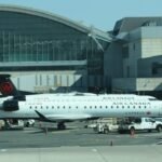 New York, United States: A serious aviation safety incident unfolded at John F. Kennedy International Airport on April 20, 2026, when two commercial passenger jets came dangerously close during parallel approaches, prompting emergency evasive action and a federal investigation. The aircraft involved were Republic Airways Flight 4464, operating as an American Airlines service, and Jazz Aviation Flight 554, operating for Air Canada Express. Both aircraft were on final approach to parallel runways when the incident occurred at approximately 2:30 p.m. local time. According to preliminary findings, the American Airlines-operated regional jet deviated from its assigned approach path and entered the airspace of the Air Canada flight, which had been cleared to land on a parallel runway. Flight tracking data indicates the American aircraft descended sharply by roughly 600 feet while drifting into the adjacent approach corridor, creating an immediate conflict with the Air Canada jet. At their closest point, the two aircraft were separated by approximately 350 feet vertically and about 0.6 miles horizontally, well below standard separation minima. Both aircraft received Traffic Collision Avoidance System (TCAS) alerts, triggering urgent resolution advisories. Pilots responded immediately, executing coordinated evasive maneuvers in line with standard safety procedures. Air traffic controllers simultaneously issued corrective instructions. The Air Canada crew was directed to climb to approximately 3,000 feet, while the American flight was instructed to correct its trajectory. Cockpit audio from the incident captured warning alarms and urgent controller instructions, underscoring the severity of the situation. Both aircraft aborted their landings and executed go-arounds before repositioning for safe arrivals. No injuries were reported, and both flights landed without further incident. Airlines involved confirmed that crews followed established procedures. Air Canada stated its pilots “received a traffic warning… and took immediate action,” while Republic Airways confirmed its crew complied with resolution advisories and safely completed a go-around. The Federal Aviation Administration has launched a formal investigation into the incident, focusing on the deviation from the assigned approach path, air traffic control coordination, and adherence to separation protocols. The event is being treated as a significant loss-of-separation incident, with authorities expected to analyse flight data, ATC communications, and TCAS responses.