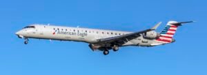 Philadelphia, United States: An American Eagle regional flight operated by PSA Airlines made an emergency diversion to Philadelphia International Airport on Wednesday morning after the crew reported a technical malfunction involving the aircraft’s nose landing gear steering system, prompting a precautionary landing. The aircraft, a Bombardier CRJ200/CRJ700 regional jet, was operating a scheduled service from Washington Reagan National Airport (DCA) to Portland International Jetport, Maine (PWM) when the issue occurred shortly after departure. According to aviation tracking data and official statements, the flight diverted to Philadelphia approximately 30 minutes into the journey after the crew detected abnormal hydraulic and steering behavior affecting the landing gear system. The aircraft landed safely at Philadelphia International Airport (PHL) around 10:20 a.m. local time, where emergency services were placed on standby as a precaution. No injuries were reported among the approximately 65 passengers and four crew members onboard. Passengers were later accommodated on a replacement aircraft to continue their journey to Maine, reaching their destination later the same day after several hours of delay. American Airlines confirmed the incident, stating that the aircraft was removed from service for a full technical inspection following the safe landing. The airline also said that all standard safety procedures were followed. The Federal Aviation Administration (FAA) has initiated a review into the incident to determine the cause of the hydraulic and steering malfunction. Initial reports suggest a nose gear steering system fault, a critical component used for directional control during taxiing and landing rollout. The aircraft involved is part of the Bombardier CRJ family, widely used in regional operations across North America. These aircraft rely heavily on hydraulic systems to control landing gear steering and braking systems, making any malfunction a serious safety concern requiring immediate diversion. Preliminary reports indicate there was no fire, smoke, or loss of control during the flight. The aircraft reportedly circled briefly before lining up for a controlled landing in Philadelphia under normal emergency protocols. The aircraft remains grounded for maintenance inspection, and investigators are expected to examine hydraulic systems, nose gear assemblies, and flight control computers as part of the FAA-led inquiry.
