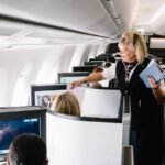 London, United Kingdom: British Airways (BA) has introduced a stricter onboard conduct policy that explicitly restricts passengers from photographing, recording, or livestreaming cabin crew without their consent, marking a significant shift in how the airline addresses privacy and onboard behaviour. The update has been incorporated into the airline’s General Conditions of Carriage under Section 11(a), classifying unauthorised filming of crew members or airline staff as “unacceptable behaviour.” Under the revised rules, British Airways states that if it reasonably believes a passenger has filmed, photographed, or live-streamed cabin crew without consent, it may take “any measures it considers reasonable” to stop the behaviour. These measures can include intervention by cabin crew, documentation of misconduct, removal of the passenger at the next landing point, cancellation of remaining flight sectors, and potential referral to authorities in serious cases. The revised policy applies broadly to the use of smartphones, digital cameras, and wearable recording devices such as smart glasses and action cameras, which are increasingly used for discreet recording onboard. While the restriction is focused on crew members and airline staff, passengers remain permitted to capture general travel content such as cabin interiors, personal selfies, and meals, provided no identifiable crew member is recorded without permission. Industry reports suggest the policy shift is being driven by a combination of rising privacy concerns and the growing influence of social media onboard aircraft. The widespread availability of high-speed in-flight Wi-Fi has enabled passengers to livestream interactions in real time, increasing the risk of incidents being broadcast without context or consent. Airlines, including British Airways have also faced increasing instances of cabin crew being recorded during service interactions, disputes, or operational disruptions, with such clips frequently circulating online. BA’s updated stance aligns with a broader industry trend where carriers are strengthening protections for frontline staff against unauthorised recording and potential online exposure. British Airways’ updated conditions reinforce that the aircraft cabin is not considered a public space under UK law, allowing airlines to enforce internal behavioural rules as a condition of carriage. Because passengers agree to these conditions upon booking, the airline maintains contractual authority to regulate conduct onboard and take enforcement action when necessary. The move places British Airways alongside other global carriers that have already introduced similar restrictions on photographing or recording crew without consent. Some airlines have also begun issuing onboard announcements reminding passengers of photography rules at the start of flights, reflecting growing industry-wide attention to privacy management in enclosed cabin environments. While the policy has been framed as a privacy protection measure for crew, it has also sparked debate among frequent flyers and content creators. Critics argue that such restrictions may make it harder for passengers to document service issues or operational concerns. However, airlines continue to provide formal complaint channels and regulatory oversight mechanisms for such matters. At the same time, cabin crew unions and industry groups have increasingly called for stronger safeguards, citing concerns over harassment, misrepresentation, and viral social media content taken out of context.