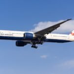 London, United Kingdom: A British Airways Boeing 777 operating flight BA2203 from London Gatwick to Cancun was forced to make an emergency return shortly after departure following reports of fumes inside the aircraft. The long-haul flight had departed Gatwick in the afternoon on April 27, 2026 and climbed to approximately 11,000 feet when crew and passengers began noticing a strong, unusual odor inside the cabin. Several onboard described the smell as similar to “dirty socks,” with some reporting dizziness and nausea as the situation developed. Recognizing the seriousness of the issue, the flight crew declared a full emergency and initiated immediate safety procedures. Oxygen masks were deployed, and pilots donned protective equipment while working to manage the situation in the cockpit. As part of standard emergency protocol, the aircraft entered a holding pattern to reduce landing weight by burning fuel. During this period, pilots also took additional measures to ventilate the cockpit, including opening cockpit windows while operating at lower altitude. The Boeing 777 remained airborne for approximately 45 minutes before safely returning to London Gatwick Airport. Emergency services were deployed on standby as the aircraft landed without further incident. Medical teams assessed passengers and crew after landing, with some individuals requiring precautionary checks following exposure to the fumes. The airline arranged assistance and accommodation for affected passengers after the flight was subsequently delayed. In an official statement, British Airways confirmed that the diversion was due to a “technical issue” and stated that the aircraft “landed safely,” adding that customers disembarked normally and the airline apologised for the disruption caused. A replacement aircraft was later arranged to continue the journey to Cancun after the incident led to a significant delay.