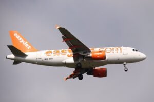 Glasgow, United Kingdom: An easyJet flight bound for Jersey was forced to return to Glasgow shortly after departure on March 29, 2026, after encountering turbulence that left a cabin crew member injured, prompting a precautionary emergency landing. Flight EZY439, operated by an Airbus A319, departed Glasgow Airport at approximately 12:00 PM local time and experienced sudden turbulence during the initial climb phase. The incident occurred within minutes of takeoff, at a time when cabin crew are typically engaged in onboard duties, increasing their exposure to in-flight disturbances. Following the incident, the flight crew made the decision to discontinue the journey and return to Glasgow as the injured crew member required medical attention. The aircraft landed safely at around 12:37 PM, roughly 37 minutes after departure, where it was met by emergency medical services on arrival. Airline officials confirmed that one cabin crew member sustained injuries, while no passengers were reported hurt. The nature and severity of the injury have not been disclosed. The airline described the situation as an “extraordinary circumstance” and reiterated that the return to base was carried out purely as a precautionary measure to ensure the safety and wellbeing of those onboard. The flight had originally been scheduled to arrive in Jersey at approximately 1:25 PM. However, due to the diversion, passengers experienced a delay of around five hours. The service was later rescheduled to depart Glasgow at about 5:15 PM and subsequently arrived in Jersey at approximately 6:33 PM. easyJet arranged assistance for passengers in line with its standard policies for delays and disruptions. In a statement, an easyJet spokesperson said the flight returned to Glasgow due to a cabin crew member requiring medical assistance and confirmed that it landed normally and was met by medical personnel. The airline emphasized that safety remains its highest priority. No official figures regarding the total number of passengers and crew onboard have been released. Additionally, there have been no reports of any damage to the aircraft, and no further updates have been provided on the condition of the injured crew member.