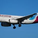 Hamburg, Germany: Eurowings Airbus A319 operating flight EW7462 was forced to make a precautionary return to Hamburg Airport shortly after departure on April 10, following a reported engine-related issue, prompting a temporary suspension of airport operations. The aircraft had departed Hamburg bound for London when the crew identified a technical malfunction, believed to be linked to one of the engines. The pilots followed standard safety procedures, entering a holding pattern over northern Germany reportedly near the Bremen-Oldenburg region before deciding to return to the departure airport. The aircraft landed safely approximately 40 to 60 minutes after takeoff. Emergency services, including fire and rescue teams, were deployed as a precaution and remained on standby during the landing. The aircraft subsequently came to a stop on a taxiway, where it was secured. There were more than 130 passengers and crew members onboard. No injuries were reported, and passengers disembarked normally using mobile stairs. Airport authorities briefly halted arrivals and departures during the incident, causing short-term operational disruption. Eurowings confirmed that the return was a precautionary measure and emphasized that safety was never compromised. The airline arranged alternative travel for affected passengers while technical teams initiated inspections of the aircraft. While initial reports indicate a possible engine warning or malfunction, the exact cause remains under investigation.