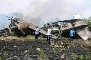 Juba, South Sudan: All 14 people on board a small passenger aircraft were killed after a Cessna 208 Caravan operated by CityLink Aviation crashed on the outskirts of South Sudan’s capital, Juba, on Monday morning. Authorities confirmed there were no survivors as rescue teams reached the remote crash site shortly after the incident. According to the South Sudan Civil Aviation Authority (SSCAA), the aircraft had departed from Yei Airport in Yei River County at around 9:15 a.m. local time, bound for Juba International Airport on a domestic passenger flight. Communication with the aircraft was lost approximately 30 minutes into the journey, around 9:43 a.m., before it went down about 20 kilometres southwest of the capital. Officials confirmed that the aircraft was carrying 13 passengers and one pilot, making a total of 14 occupants. The victims included 12 South Sudanese nationals and two Kenyan citizens. All passengers were declared dead at the scene, with no survivors reported. The aircraft involved was identified as a Cessna 208B Grand Caravan, operated by CityLink Aviation, a carrier that conducts regional flights within South Sudan. The aircraft is commonly used for short-haul operations across the country’s challenging terrain and limited aviation infrastructure. Preliminary findings from aviation authorities suggest that adverse weather conditions and poor visibility may have contributed to the crash. Officials noted that the aircraft encountered difficult weather during its approach phase, although they stressed that the investigation is ongoing and no final cause has been determined. Technical and operational factors are also being examined. Eyewitness reports and initial assessments from the crash site indicated that the aircraft came down in a hilly and remote area before bursting into flames upon impact. Debris was scattered across the site, and videos circulating on local media showed wreckage engulfed in fire before emergency teams arrived. Recovery and assessment operations were immediately launched by aviation and security authorities. The South Sudan Civil Aviation Authority has initiated a formal investigation and is working to recover flight data and technical records to determine the exact cause of the accident. Officials have also extended condolences to the families of the victims and confirmed coordination with aviation safety experts. South Sudan has faced recurring aviation safety challenges over the years due to limited infrastructure, difficult terrain, and frequent weather-related disruptions. Many domestic flights operate under demanding conditions, which continue to raise concerns over operational safety standards in the region.