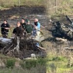 Williston, United States: A fatal crash involving a vintage military training aircraft claimed two lives near Williston Regional Airport on Sunday afternoon, prompting a federal investigation into the circumstances surrounding the accident. According to local authorities and multiple reports, the incident occurred at approximately 3:30 PM on April 13, 2026, when a North American AT-6D Texan, a historic single-engine aircraft, went down a few miles from the airport in Levy County. The crash site was located near the intersection of Northeast 30th Street and 114th Avenue. Emergency responders, including Levy County Sheriff’s deputies and fire rescue teams, arrived quickly at the scene following reports from witnesses. Officials confirmed that both individuals onboard the aircraft were killed in the crash. Their identities have not yet been released. The aircraft involved, the AT-6 Texan, is a World War II-era trainer widely used by the U.S. military between the 1930s and 1950s. Such aircraft are typically privately owned today and maintained as part of the warbird and vintage aviation community. Preliminary information indicates that the aircraft may have been a restored example in civilian operation. Authorities secured the area shortly after the crash and advised the public to avoid the vicinity while recovery and investigative efforts were underway. No injuries on the ground or damage to nearby structures have been reported so far. The Federal Aviation Administration (FAA) and the National Transportation Safety Board (NTSB) have launched a joint investigation into the accident. Officials will examine multiple factors, including the aircraft’s maintenance history, pilot credentials, weather conditions at the time of the crash, and any available flight data or eyewitness accounts. As of now, the cause of the crash remains undetermined. Investigators are expected to release further details in the coming days as evidence is analyzed. In another incident on April 10, 2026, a small aircraft crashed in Okaloosa County, Florida, after experiencing a complete engine failure, leaving two people injured. According to the Okaloosa County Sheriff’s Office, the aircraft, identified as a two-seat Cub, went down near the Baker area shortly after takeoff from a local airstrip. The pilot reported that the engine failed completely at an altitude of about 200 feet while conducting a low flyover, causing the aircraft to descend and crash onto private property. The pilot was able to exit the aircraft and call emergency services, while the passenger was trapped and had to be extricated by rescue teams. Both occupants were conscious when responders arrived and were transported to hospital, one by ground and the other airlifted as a precaution. Authorities are investigating the incident
