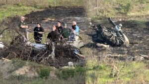 Williston, United States: A fatal crash involving a vintage military training aircraft claimed two lives near Williston Regional Airport on Sunday afternoon, prompting a federal investigation into the circumstances surrounding the accident. According to local authorities and multiple reports, the incident occurred at approximately 3:30 PM on April 13, 2026, when a North American AT-6D Texan, a historic single-engine aircraft, went down a few miles from the airport in Levy County. The crash site was located near the intersection of Northeast 30th Street and 114th Avenue. Emergency responders, including Levy County Sheriff’s deputies and fire rescue teams, arrived quickly at the scene following reports from witnesses. Officials confirmed that both individuals onboard the aircraft were killed in the crash. Their identities have not yet been released. The aircraft involved, the AT-6 Texan, is a World War II-era trainer widely used by the U.S. military between the 1930s and 1950s. Such aircraft are typically privately owned today and maintained as part of the warbird and vintage aviation community. Preliminary information indicates that the aircraft may have been a restored example in civilian operation. Authorities secured the area shortly after the crash and advised the public to avoid the vicinity while recovery and investigative efforts were underway. No injuries on the ground or damage to nearby structures have been reported so far. The Federal Aviation Administration (FAA) and the National Transportation Safety Board (NTSB) have launched a joint investigation into the accident. Officials will examine multiple factors, including the aircraft’s maintenance history, pilot credentials, weather conditions at the time of the crash, and any available flight data or eyewitness accounts. As of now, the cause of the crash remains undetermined. Investigators are expected to release further details in the coming days as evidence is analyzed. In another incident on April 10, 2026, a small aircraft crashed in Okaloosa County, Florida, after experiencing a complete engine failure, leaving two people injured. According to the Okaloosa County Sheriff’s Office, the aircraft, identified as a two-seat Cub, went down near the Baker area shortly after takeoff from a local airstrip. The pilot reported that the engine failed completely at an altitude of about 200 feet while conducting a low flyover, causing the aircraft to descend and crash onto private property. The pilot was able to exit the aircraft and call emergency services, while the passenger was trapped and had to be extricated by rescue teams. Both occupants were conscious when responders arrived and were transported to hospital, one by ground and the other airlifted as a precaution. Authorities are investigating the incident
