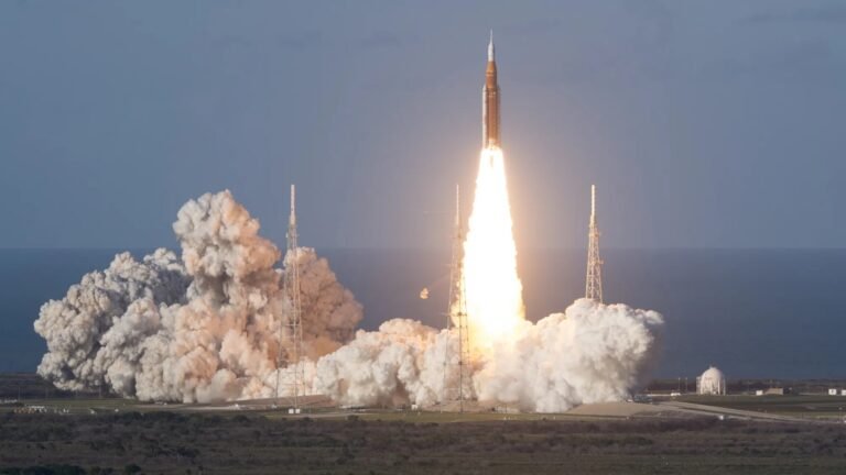 Cape Canaveral, United States: NASA has launched the Artemis II mission, sending four astronauts on a historic journey around the Moon and marking humanity’s return to crewed deep space exploration for the first time since the Apollo era. The mission lifted off from Launch Complex 39B at Kennedy Space Center on April 1, 2026 aboard NASA’s Space Launch System (SLS), carrying the Orion spacecraft on its first crewed flight. Artemis II is the agency’s first mission to send astronauts beyond low Earth orbit in over 50 years and represents a defining milestone in the United States’ long-term lunar exploration strategy. NASA has positioned Artemis II as a critical test mission, designed to validate the systems required for sustained human presence beyond Earth. According to NASA’s official mission brief, Artemis II will be the first crewed flight of both the SLS rocket and Orion spacecraft, testing their combined performance in deep space. The mission will demonstrate capabilities including life-support systems, navigation, communication, and crew operations under deep space conditions. The Orion spacecraft, developed as NASA’s next-generation crew vehicle, is central to the agency’s long-term goal of enabling missions not only to the Moon but eventually to Mars. Artemis II is a 10-day mission that will follow a free-return trajectory around the Moon, allowing the spacecraft to loop back to Earth without requiring additional propulsion in case of emergencies. After launch, the crew entered high Earth orbit to conduct initial system checks and manual flight demonstrations before executing a trans-lunar injection burn to begin their journey toward the Moon. NASA’s official mission timeline indicates: Transit to the Moon will take approximately four days Closest approach to the lunar surface will occur around flight day six The mission may set a new record for the farthest distance traveled by humans from Earth The spacecraft is expected to travel more than 250,000 miles from Earth, surpassing distances achieved during the Apollo programme. The Artemis II crew comprises NASA astronauts Reid Wiseman (Commander), Victor Glover (Pilot), Christina Koch (Mission Specialist), and Canadian Space Agency astronaut Jeremy Hansen (Mission Specialist). The mission marks several historic firsts: First woman assigned to a lunar mission First Black astronaut on a lunar trajectory First non-American astronaut to travel beyond low Earth orbit NASA has emphasized that the mission reflects increasing international collaboration in space exploration. Artemis II follows the successful uncrewed Artemis I mission conducted in 2022 and represents the next step in NASA’s broader Artemis programme. The agency’s roadmap includes: Artemis III: A crewed lunar landing mission Artemis IV and beyond: Development of long-term infrastructure, including a lunar orbital platform and sustained human presence NASA states that Artemis missions aim to enable scientific discovery, economic opportunities, and technological advancement, while laying the groundwork for future human missions to Mars. The launch follows extensive preparation, including a Flight Readiness Review and rollout of the SLS rocket and Orion spacecraft to the launch pad in March 2026. NASA engineers conducted final system checks and resolved ground support issues ahead of launch, ensuring mission readiness within a targeted April launch window. Initial mission updates indicate that the spacecraft is performing as expected, with astronauts completing system checks and trajectory operations in high Earth orbit before heading toward the Moon. Minor issues, including brief communication disruptions, have been reported but are within expected parameters for a test mission of this scale. NASA officials have maintained a cautious tone, emphasizing that Artemis II is a test flight designed to identify and address challenges before future landing missions. Artemis II is widely viewed as a turning point in modern space exploration, re-establishing human capability to operate beyond Earth orbit after more than five decades. NASA has described the mission as essential to “verify modern human capabilities in deep space” and to prepare for sustained lunar exploration and eventual missions to Mars. With increasing global interest in lunar exploration and participation from international partners, Artemis II marks the beginning of a new era of human spaceflight, one that extends beyond symbolic missions toward long-term presence beyond Earth.