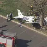 Flight Instructor And Student Injured In Northeast Philadelphia Training Flight Crash SEO DES: The aircraft operated by Fly Legacy Aviation crashed after an engine failure during a routine lesson. Both onboard survived with non-life-threatening injuries SOCIAL: A training aircraft operated by Fly Legacy Aviation crashed in Northeast Philadelphia on April 1 after an engine failure during a routine lesson, injuring an instructor and a student pilot identified as an off-duty police officer. The instructor attempted an emergency return, but the aircraft clipped a tree and crashed into Fluehr Park. Both occupants survived with non-life-threatening injuries, no one on the ground was hurt, and authorities, including the Federal Aviation Administration and National Transportation Safety Board, have launched an investigation. Philadelphia, United States: A training aircraft operated by a local flight school crashed in a residential park in Northeast Philadelphia on April 1, injuring two people onboard a flight instructor and a student pilot after an attempted emergency landing went wrong. The aircraft, identified as a Piper PA-28 (Pilot 100i), was being used for a routine instructional flight by Fly Legacy Aviation, a Philadelphia-based flight training academy. The flight had departed from Northeast Philadelphia Airport shortly before the incident. Authorities confirmed that the student pilot was the off-duty officer. Both occupants survived the crash and were transported to hospital. Officials stated they were conscious and alert, though they sustained serious but non-life-threatening injuries. Preliminary findings indicate the aircraft experienced a loss of engine power mid-flight, reportedly while flying over or near the Delaware River. The instructor initiated emergency procedures and attempted to return toward the airport. However, during the descent, the aircraft clipped a tree, lost stability and spun before crashing into Fluehr Park, a public park surrounded by residential homes. Emergency responders reached the scene quickly. Despite a minor fuel leak, no fire broke out. Authorities confirmed, no injuries on the ground and no structural damage to nearby homes Officials noted the outcome could have been significantly worse given the densely populated neighborhood surrounding the crash site. Eyewitnesses described a sudden loss of altitude before impact. One local resident told the media the aircraft appeared to be “coming down fast and struggling to stay level.” Police officials confirmed that one of the injured individuals was an off-duty officer and stated that both victims were “extremely fortunate to survive” given the nature of the crash. Emergency responders, including police and fire crews, secured the area and assisted in extraction and evacuation. The Federal Aviation Administration (FAA) and the National Transportation Safety Board (NTSB) have launched a formal investigation.
