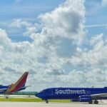 Nashville, United States: A serious aviation incident involving two Southwest Airlines Boeing 737 aircraft near Nashville International Airport has prompted a federal investigation after the jets came within close proximity following an air traffic control error that placed them on conflicting flight paths. The incident occurred as Southwest Flight 507, a Boeing 737 MAX 8 arriving from Myrtle Beach, initiated a go-around during its approach, while Southwest Flight 1152, a Boeing 737-700, was departing for Knoxville from a separate runway. According to preliminary findings and air traffic control audio reviewed by investigators, a controller issued a turn instruction to the arriving aircraft that inadvertently directed it into the departure path of the other jet, creating an immediate loss of safe separation. Air traffic control communications captured during the event indicate a rapidly escalating situation, with multiple instructions issued in quick succession, including climb directives that were later revised. In the cockpit, one of the pilots indicated the aircraft had already passed the point of conflict, reflecting how little time remained to resolve the situation through conventional means. Both aircraft subsequently received alerts from the onboard Traffic Collision Avoidance System (TCAS), which generated coordinated Resolution Advisories. The system instructed one aircraft to climb while directing the other to descend, allowing the crews to take immediate corrective action. Flight data suggests the jets of Southwest Airlines came within approximately 500 feet of each other, a distance considered a near midair collision under aviation safety standards. Despite the severity of the encounter, both flights continued safely with no reported injuries. Early assessments point to air traffic control error as the primary factor, compounded by the complexity of simultaneous runway operations during a go-around. Weather conditions, including reported gusty winds in the Nashville area, may also have contributed to the challenging operating environment at the time. The Federal Aviation Administration has launched a formal investigation and is expected to review controller actions, radar data, flight recordings, and adherence to separation protocols. Southwest Airlines stated that its flight crews responded in accordance with safety procedures and are cooperating fully with authorities. On April 15, 2026, a near-collision occurred at Charlotte Douglas International Airport when an American Airlines aircraft was forced to abruptly brake on the taxiway after a truck crossed directly in front of it, narrowly avoiding impact. The cockpit radio transmissions captured the crew reporting the close call to air traffic control. No injuries were reported, and the aircraft was able to continue and depart after a brief delay. The incident occurred on the airport tarmac and has drawn attention to ground movement safety, coming shortly after a fatal aircraft-vehicle collision at New York’s LaGuardia Airport, emphasising ongoing concerns over coordination between aircraft and ground vehicles.