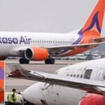 New Delhi, India: A ground collision between two commercial aircraft operated by SpiceJet and Akasa Air at Indira Gandhi International Airport has prompted a regulatory investigation, after both planes sustained damage during taxi operations on Thursday afternoon. The incident occurred at approximately 2:15 PM at Terminal 1, involving a SpiceJet Boeing 737-700 (VT-SLB) arriving from Leh and an Akasa Air Boeing 737 MAX 8 scheduled to operate flight QP1406 from Delhi to Hyderabad. According to the Directorate General of Civil Aviation (DGCA), the SpiceJet aircraft was taxiing into its designated parking bay after landing when its right winglet struck the left horizontal stabiliser (tail section) of the Akasa aircraft. The Akasa aircraft had already been pushed back from its bay and was positioned for engine start, effectively stationary at the time of impact. Preliminary findings indicate that the SpiceJet aircraft had been cleared by air traffic control to taxi toward bay No. 106 after confirming separation from the Akasa aircraft. However, during the manoeuvre, the aircraft reportedly executed a turn without wing walker clearance, leading to contact between the two planes. Flight tracking data and initial reports suggest the SpiceJet jet was pulling into the gate, while the Akasa aircraft was in pushback or preparing to taxi out for departure. The collision resulted in visible structural damage to both aircraft: SpiceJet: Right winglet damaged Akasa Air: Left-hand horizontal stabiliser damaged The winglet of the SpiceJet aircraft briefly lodged into the Akasa aircraft’s tail section following impact. No injuries were reported. All passengers and crew onboard the Akasa aircraft were safely disembarked, and the airline arranged alternate travel for passengers bound for Hyderabad SpiceJet described the incident as a “ground occurrence while taxiing”, confirming that its aircraft has been withdrawn from service pending checks. Akasa Air stated that its aircraft was stationary when the contact occurred, and confirmed that all standard safety protocols were followed after the incident. The Directorate General of Civil Aviation has launched a detailed investigation into the incident. The probe will examine ground handling procedures, ATC instructions, aircraft separation standards, and taxi coordination protocols.