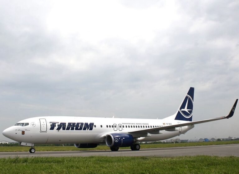 Bucharest, Romania: A serious in-flight medical emergency involving a TAROM Boeing 737 has raised renewed concerns over pilot fatigue after a co-pilot collapsed during a scheduled European service, prompting an emergency response and regulatory scrutiny. The incident occurred on April 16, 2026, during a return flight operated by Romania’s national carrier TAROM from Amsterdam Schiphol Airport to Bucharest Henri Coandă International Airport. The 57-year-old co-pilot had not slept the night before reporting for duty, a factor that investigators later identified as central to the event. The crew had earlier completed an outbound sector from Bucharest to Amsterdam, during which the co-pilot reportedly felt unwell. Despite his condition, he continued operating and joined the return flight shortly after arrival, reflecting a tight turnaround schedule. During the return leg, the co-pilot’s condition deteriorated. Reports indicate that approximately 50 minutes after departure he began feeling worse, and about 2 hours and 40 minutes into the flight, he lost consciousness in the cockpit. The captain declared an emergency and continued the flight, ensuring a safe landing in Bucharest. Medical teams were positioned on arrival and boarded the aircraft immediately to attend to the incapacitated crew member. Passengers reported to be 87 onboard were disembarked via rear stairs to allow rapid access to the cockpit. Initial findings reported that the pilot’s collapse was linked to extreme fatigue after “not sleeping a wink the night before,” reinforcing the seriousness of the situation. Romanian aviation authorities classified the occurrence as a “serious safety event,” citing the direct implications of cockpit incapacitation during flight.