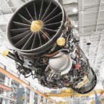 Bengaluru, India: India has taken a significant step forward in its indigenous fighter jet programme after state-run Hindustan Aeronautics Limited (HAL) and GE Aerospace concluded a critical technical agreement for the co-production of F414 jet engines, paving the way for a final commercial contract expected later this year. The development marks a major milestone in India’s defence manufacturing ambitions, as the F414 engine is slated to power three key indigenous combat aircraft the Tejas Mk2, the Twin Engine Deck-Based Fighter (TEDBF), and the initial variant of the Advanced Medium Combat Aircraft (AMCA). HAL and GE Aerospace have finalised the technical aspects of the agreement, including complex negotiations around technology transfer widely regarded as the most challenging phase of the deal. With this stage completed, both sides have moved into commercial negotiations, which are expected to take additional time due to rising global component costs and pricing complexities. Officials indicate that the final contract could be signed within the current financial year, marking the culmination of negotiations that have been underway for nearly three years. A central feature of the agreement is the transfer of approximately 80% of manufacturing technology from GE Aerospace to HAL, one of the most substantial technology transfer arrangements ever secured by India in the aerospace sector. The deal will enable India to manufacture advanced fighter jet engines domestically, significantly reducing dependence on imports and strengthening long-term self-reliance in critical defence technologies. Under the agreement: 99 F414 engines are planned to be manufactured in India for the Tejas Mk2 programme The Indian Air Force (IAF) has projected a requirement of 120–130 Tejas Mk2 aircraft, indicating further engine demand The co-production programme will involve licensed manufacturing in India, not just assembly The engine, capable of delivering around 98 kN of thrust, is critical for the performance requirements of next-generation Indian fighter platforms. Tejas Mk2 The F414 engine will power the Tejas Mk2, a more advanced and heavier variant of the Light Combat Aircraft designed to replace ageing fleets and enhance the IAF’s combat capability. TEDBF (Naval Fighter) The Twin Engine Deck-Based Fighter, intended for aircraft carrier operations, will rely on dual F414 engines for enhanced thrust and maritime capability. AMCA (5th-Generation Fighter) The initial version of India’s fifth-generation stealth fighter, AMCA Mk1, is also expected to use the F414 engine before transitioning to a more powerful indigenous or co-developed engine in later variants. The agreement is expected to play a key role in: Boosting indigenous defence manufacturing under the “Make in India” initiative Strengthening India–US defence cooperation, particularly in high-end aerospace technologies Addressing the Indian Air Force’s declining squadron strength, a major operational concern Enabling future fighter programmes without dependence on foreign engine supplies Experts note that local production of such high-performance engines represents a critical capability gap that India has long sought to bridge. The HAL–GE engine collaboration traces back to a Memorandum of Understanding signed in June 2023, during Prime Minister Narendra Modi’s visit to the United States. Since then, negotiations have focused heavily on securing deep technology transfer, with India insisting on a minimum threshold of around 80% for the deal to proceed. Following the conclusion of technical discussions in April 2026, the programme has now entered its final phase before contract signing. Once finalised, the agreement will not only power multiple indigenous fighter programmes but also mark a decisive shift towards domestic production of advanced jet engines, a capability currently limited to a handful of countries worldwide.