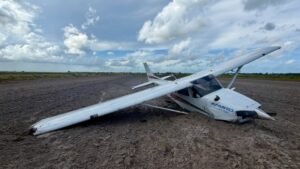 Florida, United States: A training aircraft belonging to Florida-based flight school Aamro Aviation was involved in an emergency forced landing Friday afternoon after a reported engine malfunction caused the aircraft to crash into a field near Hobe Sound, Florida, authorities said. According to the Martin County Sheriff’s Office, the incident occurred shortly after 3 p.m. west of Interstate 95 near Hobe Sound. Deputies and Martin County Fire Rescue crews responded after the aircraft went down in an open dirt field following an apparent loss of engine power. Both occupants, a flight instructor and a student pilot survived the crash and escaped without serious injuries. The aircraft involved was identified as a 2023-built Cessna 172S Skyhawk SP registered as N294PL. The aircraft sustained “substantial damage” during the forced landing after experiencing engine power loss near Tailwinds Airport (FD15). Flight tracking data showed the aircraft departed from North Palm Beach County General Aviation Airport before the emergency unfolded. Reports indicated the airplane was operating as a training flight carrying a certified flight instructor and a student pilot at the time of the accident. Photos released from the scene showed the white single-engine aircraft heavily damaged in the field after the emergency landing. Preliminary information from investigators suggests the instructor attempted an off-airport forced landing after the engine malfunction occurred. The Federal Aviation Administration is expected to investigate the incident alongside the National Transportation Safety Board to determine the exact cause of the reported engine failure and circumstances leading to the crash landing.