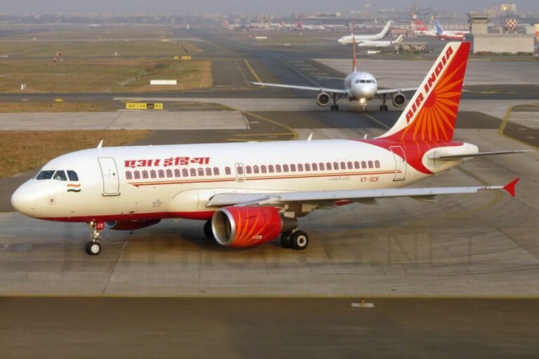 AAIB Flags Civil-Military ATC Coordination Lapses In Air India-Navy Helicopter Near Miss SEO DES: Investigators said poor ATC traffic assessment put both aircraft in conflict, forcing the Navy helicopter crew to take evasive action SOCIAL: India’s AAIB has released its final report into a serious February 2024 near-miss between an Air India A319 and an Indian Navy ALH helicopter near Port Blair airport. Investigators found that inadequate traffic assessment by ATC led both aircraft into conflicting airspace, forcing the helicopter crew to take evasive action after receiving a traffic warning. The report also flagged unnecessary cockpit radio conversations by the Air India crew and raised broader concerns over weak coordination between civil and military aviation authorities at joint-use airports. AAIB has recommended stronger civil-defence coordination, improved ATC procedures and installation of secondary surveillance radar at Port Blair. Image: Sean D Silva (Flickr) Video: Air India | Indian Navy Port Blair, India: India’s Aircraft Accident Investigation Bureau (AAIB) has released its final investigation report into a serious midair proximity incident involving an Air India Airbus A319 and an Indian Navy Advanced Light Helicopter (ALH) Mk III near Port Blair airport, raising major safety concerns over coordination between civil and military aviation operations at joint-use aerodromes. The incident occurred on February 2, 2024, at Veer Savarkar International Airport in Port Blair, a defence-operated airport that handles both military and civilian aircraft movements. The Air India aircraft, operating flight AI788 from Port Blair to Kolkata, came into close proximity with an Indian Navy ALH Mk III helicopter during departure operations, prompting an evasive manoeuvre by the helicopter crew to avoid a potential collision. According to the AAIB final report, the Air India Airbus A319, registered VT-SCV, had departed Runway 04 after receiving clearance from Air Traffic Control, while the Navy helicopter was simultaneously conducting a training sortie in the north-east local flying area. The helicopter crew had been carrying out a localiser approach procedure when the conflict developed between the two aircraft. Investigators stated that the approach controller allowed both aircraft to operate within conflicting airspace during a critical phase of flight, leading to rapidly reducing separation between the departing Airbus and the inbound helicopter. The helicopter subsequently received a Traffic Advisory warning from its onboard collision avoidance system, alerting the crew to the developing risk. The Navy pilots immediately initiated a sharp right turn to avoid crossing the Airbus’ climb path. Following the evasive manoeuvre, the helicopter discontinued its approach and safely recovered back at base, while the Air India aircraft continued its climb and proceeded normally toward Kolkata. The AAIB classified the occurrence as a “serious incident” and launched a full investigation under India’s Aircraft (Investigation of Accidents and Incidents) Rules. In its findings, the bureau concluded that the probable cause of the incident was the “inadequate assessment of the traffic situation by the approach controller,” which resulted in reduced separation and dangerous proximity between the two aircraft. The investigation also identified communication-related concerns involving the Air India cockpit crew. According to the report, the Pilot-in-Command engaged in what investigators described as “undue conversation” with Air Traffic Control during a critical stage of flight, contributing to unnecessary radio frequency congestion. The AAIB recommended that Air India reinforce proper radio telephony discipline among its pilots. Apart from the immediate operational factors, the report highlighted broader systemic concerns regarding aviation safety coordination between civil and military authorities in India. The bureau noted that there is currently no formal framework for regular exchange of safety-related information between the AAIB, Directorate General of Civil Aviation (DGCA), Indian Navy, Indian Air Force and Indian Army, despite repeated recommendations issued after previous military aviation investigations. The report referenced earlier incidents involving aircraft VT-MPQ at Gwalior in 2021 and VT-PTE at Umari in 2023, where similar coordination gaps had already been identified. Investigators observed that several earlier safety recommendations remain pending implementation. To address the risks identified during the Port Blair incident investigation, the AAIB issued multiple safety recommendations. These include establishing a formal civil-defence aviation coordination mechanism, reviewing DGCA Civil Aviation Requirements involving military aircraft and defence aerodromes, improving Air Traffic Control coordination procedures at joint-use airports, strengthening radio communication discipline and installing a secondary surveillance radar system at Port Blair to support safer traffic management as aircraft movements continue increasing in the region. The bureau stressed that stronger integration between civilian and military aviation systems is becoming increasingly important as mixed-use airports handle higher traffic volumes and more complex operations.
