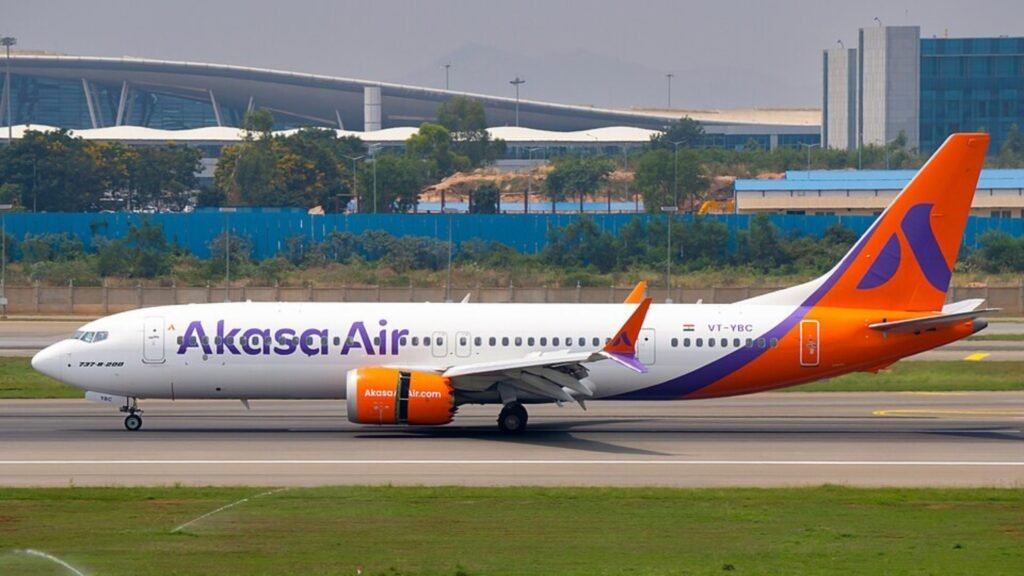 Lucknow, India: An Akasa Air Boeing 737 MAX 8 operating from Bengaluru to Bhubaneswar made an emergency landing at Lucknow’s Chaudhary Charan Singh International Airport on May 27 after the flight encountered adverse weather conditions at its destination and subsequently reported low fuel levels during diversion. The flight, operating as QP1503 and registered as VT-YAJ, was carrying a total of 194 passengers and crew members onboard when the incident occurred. According to multiple media reports and airport officials, the aircraft was initially unable to land at Bhubaneswar due to unfavorable weather conditions. The flight was subsequently diverted to Lucknow at approximately 8:40 PM local time. While approaching Lucknow, the crew reportedly issued a “PAN PAN” call to Air Traffic Control (ATC) at around 9:02 PM after fuel levels became critically low during the extended diversion. In aviation terminology, a “PAN PAN” declaration indicates an urgent situation requiring priority assistance, though it is considered less severe than a “MAYDAY” distress call. The pilot-in-command requested priority handling and a clear approach to ensure the aircraft could land safely in a single attempt amid fuel constraints. Following the alert, Lucknow ATC declared a full emergency and immediately activated standard emergency response procedures. Crash fire tenders and emergency response teams were positioned at designated points along Runway 09 by approximately 9:04 PM as a precautionary measure. The aircraft landed safely at Lucknow International Airport at around 9:21 PM. Shortly after touchdown, the flight crew informed ATC that all aircraft operations were normal and that no emergency assistance was required. Authorities subsequently withdrew the full emergency status at approximately 9:30 PM. Airport officials confirmed that all emergency and safety protocols were executed as per standard operating procedures and that the situation was handled without incident. No injuries to passengers or crew were reported. According to reports, three passengers deboarded the aircraft in Lucknow before the flight later resumed its journey to Bhubaneswar. In an official statement, Akasa Air confirmed that the diversion was caused by adverse weather conditions at Bhubaneswar and stated that the crew followed all established operational and safety procedures throughout the incident. “Akasa Air flight QP 1503 operating from Bengaluru to Bhubaneswar on 27 May 2026 was diverted to Lucknow due to adverse weather conditions, which were not favourable for landing. The pilot followed all established operational and safety protocols in line with standard procedures,” the airline said. The carrier further stated that the flight later departed Lucknow and landed safely in Bhubaneswar at 00:02 hrs on May 28. “At Akasa Air, the safety and well-being of our passengers and crew remain our highest priority. We regret the inconvenience caused due to circumstances beyond our control and appreciate our passengers’ understanding,” the airline added.