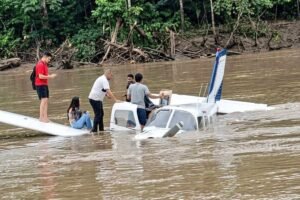 the riverbank following the controlled landing. Jordao, Brazil: A Piper PA-32 Cherokee Six carrying 7 occupants made an emergency landing in a river in Brazil’s remote Acre state after suffering an apparent engine failure shortly after departure, according to regional aviation reports. The incident occurred on May 7, 2026, near Jordão Airport in Acre, a remote region in western Brazil surrounded by dense Amazon rainforest and limited emergency infrastructure. Preliminary information indicates the single-engine aircraft experienced power loss shortly after takeoff, forcing the pilot to attempt an emergency return before conducting a controlled landing on a river. The aircraft involved was a Piper PA-32 Cherokee Six. The pilot reportedly attempted to return to Jordão Airport after the engine malfunction but was unable to maintain normal flight operations, leading to the emergency water landing. All seven people onboard survived the accident. Initial reports stated that the occupants suffered only minor injuries, although local rescue assessments were still ongoing at the time of publication. No fatalities were reported. Images and local reports circulating online showed the aircraft partially submerged near the riverbank after the forced landing. Residents from nearby communities and local emergency responders reportedly assisted survivors before additional authorities arrived at the scene. The Piper PA-32 Cherokee Six is widely used across Latin America for private transport, regional connectivity, and remote-area operations because of its ability to operate from shorter airstrips. However, emergency situations in isolated rainforest regions can become significantly more complex due to geography, weather conditions, and rescue limitations. Authorities have not yet released the exact cause of the engine failure. Brazilian aviation investigators are expected to examine the aircraft and review maintenance records, pilot communications, weather conditions, and engine performance data as part of the ongoing investigation. No official statement had been released by Brazil’s aviation accident investigation authorities.