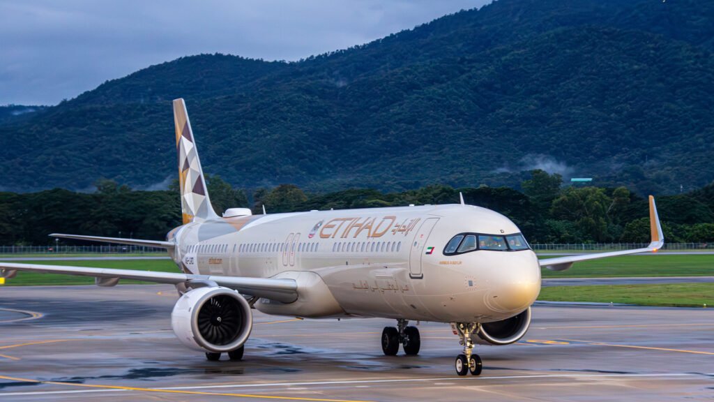 Etihad Airways Flight To London Returns To Abu Dhabi After Mid-Air Technical Issue SEO DES: The airline arranged a replacement aircraft for passengers, while the incident caused delays and wider disruption across Etihad’s network SOCIAL: Etihad Airways flight EY061 returned safely to Abu Dhabi shortly after takeoff for London Heathrow on May 20 after the crew detected a technical issue onboard. The airline arranged a replacement aircraft for passengers, while the incident also caused delays to return services and wider scheduling disruptions across Etihad’s network. No injuries were reported among passengers or crew, and the aircraft landed safely at Zayed International Airport as a precautionary measure. Abu Dhabi, United Arab Emirates: Etihad Airways flight EY061 from Abu Dhabi to London Heathrow was forced to return to Zayed International Airport shortly after takeoff on May 20 after the crew detected a technical issue onboard. The flight had departed Abu Dhabi normally before pilots decided to discontinue the long-haul journey and return as a precautionary measure. The aircraft landed safely back in Abu Dhabi, and no injuries were reported among passengers or crew. Etihad Airways confirmed the incident in a statement, saying the return was carried out due to a “technical issue” and stressing that “safety remains our highest priority.” The airline later arranged a replacement aircraft to transport affected passengers to London Heathrow. The Abu Dhabi-based carrier has increasingly relied on its reactivated Airbus A380 fleet for high-demand routes including London Heathrow after bringing several superjumbos back into service in recent years. The London route remains one of Etihad’s flagship long-haul operations. The airlines across the Middle East continue dealing with airspace restrictions, regional tensions, and frequent route adjustments that have added pressure on flight operations and scheduling across the region. Passengers experienced delays as ground teams inspected the aircraft and operational controllers coordinated an alternative departure. The disruption also affected the return London–Abu Dhabi rotation, creating knock-on scheduling delays within Etihad’s long-haul network.