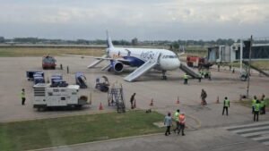 Chandigarh, India: A potentially serious aviation incident was narrowly avoided at Shaheed Bhagat Singh International Airport on May 5 after a passenger’s power bank caught fire onboard an IndiGo flight shortly after landing, prompting panic and an emergency evacuation that left six people injured. The incident involved flight 6E-108 from Hyderabad to Chandigarh, which had already landed and was taxiing toward the bay when the fire broke out inside the cabin. According to officials, the fire originated from a power bank stored in a seat pocket by a passenger seated in row 39C. The device suddenly ignited, producing smoke and flames that quickly spread inside the aircraft cabin. “After landing during a taxi into the bay at Chandigarh, a Power Bank kept in a pouch in the seat pocket by a passenger seated on 39C caught fire,” officials said. Passengers onboard reported a sudden build-up of smoke, triggering panic. “There was smoke in the cabin and people began panicking,” a passenger said. The cabin crew responded immediately, using onboard fire extinguishers to contain the blaze. “Cabin Crew used two fire extinguisher bottles to extinguish the fire,” officials said. As a precautionary measure, the crew initiated a full emergency evacuation, deploying all six slides. The aircraft was carrying around 198 passengers and six crew members, all of whom were evacuated safely. However, six passengers sustained injuries during the evacuation and were taken to hospital. The injuries were reported to be minor and largely occurred while using the evacuation slides. “All passengers and crew were safely evacuated,” officials said. Passenger Kapoor said several elderly travellers required medical attention. Ajay Verma, CEO of Chandigarh International Airport, said, “Emergency response teams acted immediately after the incident was reported, and all necessary protocols were followed to ensure passenger safety,” said. He added that airport authorities worked in coordination with airline staff and emergency services to manage the situation efficiently. Passengers described chaotic scenes during the evacuation and raised concerns over safety measures onboard. “Had this happened mid-air, it could have been much worse,” a passenger said. Some travellers also questioned the screening of electronic devices, particularly power banks, before boarding. Passengers alleged that airline staff failed to properly regulate the use and monitoring of power banks onboard, raising concerns about enforcement of safety norms. Some travellers questioned whether stricter checks or clearer instructions could have prevented the incident, pointing out that portable electronic devices, particularly lithium-ion batteries, pose known fire risks if not handled correctly. They urged airlines to reinforce guidelines and ensure better awareness among passengers regarding the safe storage and use of such devices during flights In its official statement, IndiGo confirmed the incident and reiterated its commitment to safety. “On 5 May 2026, while IndiGo flight 6E 108 from Hyderabad to Chandigarh was stationary after landing, an incident involving a customer's personal electronic equipment catching fire was reported,” the airline said. “In the interest of safety, an immediate evacuation was carried out and all the relevant authorities were immediately informed. All customers have been safely moved to the terminal and are being attended to by the team to ensure their well-being. The aircraft will undergo necessary checks before resuming operations. At IndiGo, the safety of our customers and crew remains our top priority,” the airline added. Authorities have initiated an investigation to determine the exact cause of the fire and assess adherence to safety protocols. The incident shows the risks associated with lithium-ion batteries, particularly power banks, which are known to pose fire hazards under certain conditions. Importantly, the fire occurred after the aircraft had landed, preventing what could have been a far more dangerous mid-air situation. Swift action by the cabin crew and airport emergency teams ensured the situation was contained without serious injuries. However, the incident has raised concerns regarding the handling and monitoring of portable electronic devices on flights.