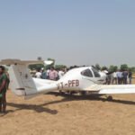 Aligarh, India: A training aircraft belonging to a private flying club made an emergency landing in an agricultural field in Uttar Pradesh’s Aligarh district on Sunday after suffering a technical malfunction during a routine training sortie, with both occupants escaping safely, according to the officials and PTI . The aircraft involved in the incident was identified as a Diamond DA-40, a single-engine, four-seater trainer aircraft bearing registration VT-PFB, which was operating from Dhanipur Airport in Aligarh when the crew reported a mid-air technical snag prompting the pilots to carry out a precautionary landing in a field near Changeyri (also reported as Changari) village under the Harduaganj police station area. Officials said the aircraft belonged to the Pioneer Flying Club, one of the pilot training organisations operating from Dhanipur Airport. The incident occurred during a scheduled training exercise on Sunday morning, with reports placing the emergency landing between approximately 9:30 am and 11 am. The instructor pilot and trainee pilot safely exited the aircraft after the landing and did not suffer injuries. Both were later taken to a district hospital for routine medical examination. Eyewitnesses said panic spread among villagers after they saw the aircraft descending suddenly towards the ground. However, the plane landed safely in the field without causing any damage or injuries. Following the incident, local police, fire brigade personnel and district administration officials rushed to the spot. City Magistrate Atul Gupta and Airport Director Satyavrat also inspected the site. Authorities said the pilots managed to bring the aircraft down safely in the agricultural field without causing casualties or significant structural damage to the aircraft. The successful emergency handling prevented what officials described as a potentially serious accident. City Magistrate Atul Gupta confirmed that airport authorities were informed shortly after the incident and emergency response teams were dispatched to the site. Officials from the Airports Authority of India (AAI) subsequently initiated a probe into the technical malfunction and circumstances leading to the forced landing. Last year, a trainee pilot from Pioneer Flying Club crashed a solo-operated Diamond DA-40 trainer aircraft at Aligarh’s Dhanipur Airstrip after the aircraft reportedly skidded off the runway during landing and slammed into the airport boundary wall. The May 2025 incident occurred during a routine solo training sortie, with trainee pilot escaping unhurt despite the aircraft sustaining heavy damage to its nose and front landing gear. Also, in January 2022, a Cessna 172 aircraft from the same academy made an emergency landing in an agricultural field near Dhanipur airstrip during a night cross-country training session. Both the instructor and trainee pilot survived with minor injuries.