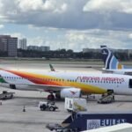 Amsterdam, Netherlands: A Surinam Airways flight from Amsterdam to Paramaribo suffered a landing gear door malfunction on May 8, creating significant aerodynamic drag and increased fuel burn that forced the aircraft to return to Amsterdam as a precaution. The flight was being operated by Universal Sky Carrier under a wet-lease arrangement using a former Lufthansa Airbus A340-600. After identifying the issue, the crew opted to discontinue the flight and initiated a precautionary return to Schiphol. The aircraft reportedly remained airborne for some time to manage fuel levels before safely landing back in Amsterdam without further incident. No injuries among passengers or crew were reported. Emergency services were positioned as a standard precaution during the aircraft’s return. The disruption resulted in a delay to the Amsterdam-Paramaribo service as the aircraft required technical inspection following landing. The mandatory crew rest requirements and maintenance checks led to the flight being rescheduled for departure on May 10. The incident comes as Surinam Airways continues relying on Airbus A340 aircraft for its long-haul Amsterdam operations amid ongoing fleet and operational challenges. The carrier has operated multiple leased A340 variants over recent years, including aircraft previously sourced from Air Belgium and other operators for the Paramaribo route. The airline has faced earlier operational disruptions involving Airbus A340 aircraft, including flap-related return incidents and temporary aircraft groundings on the Amsterdam sector. While no official technical statement has yet been released detailing the exact cause of the landing gear door malfunction, the aircraft landed safely and no damage or injuries were reported.